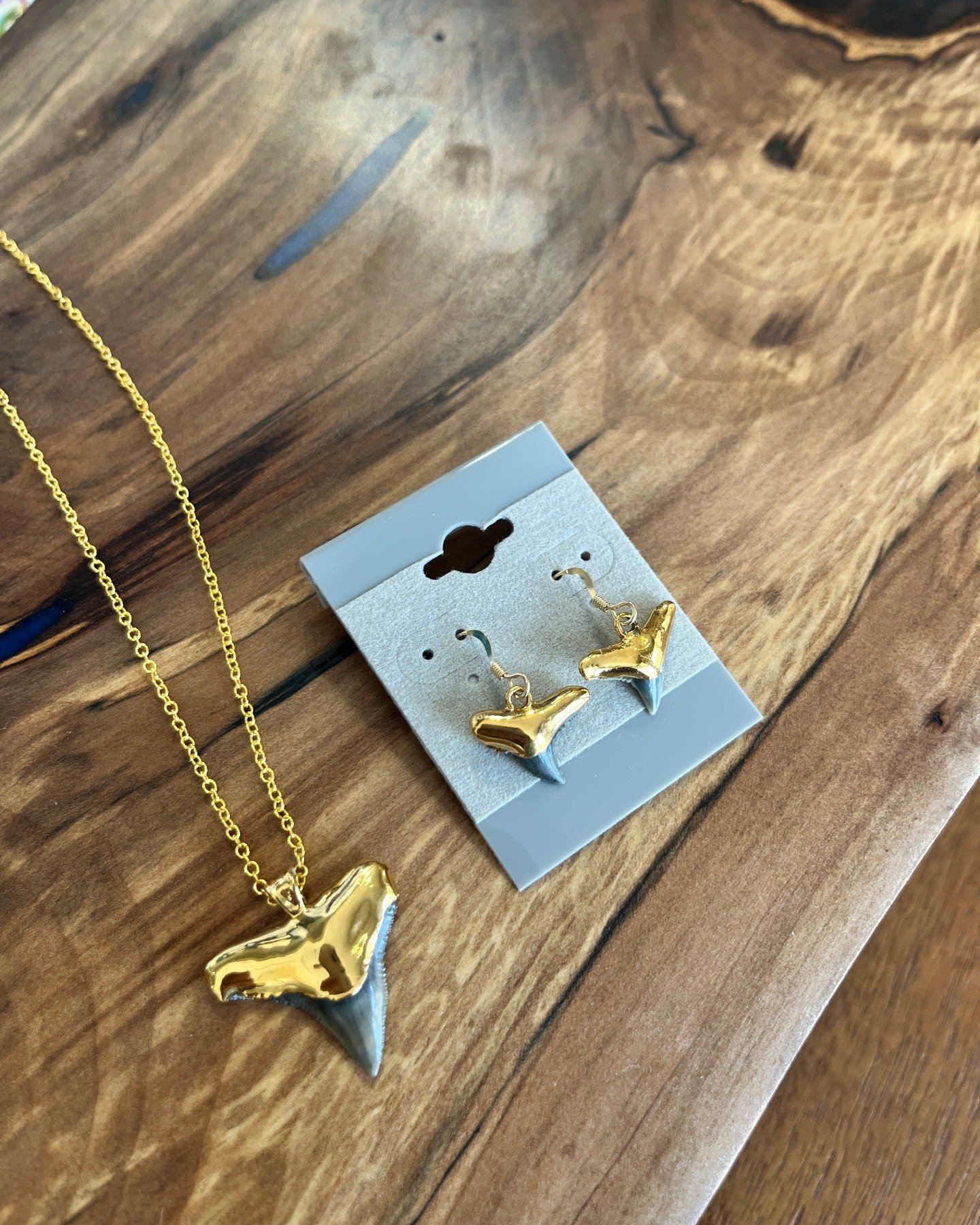 Nickel &amp; 18k Gold Electroformed Shark t00th Earrings and Necklaces are a top seller at Earth Treasures! We also carry a wide variety of wire-wrapped and beaded Shark T00th Jewelry styles for you to choose from! Come check us out today!