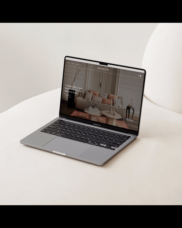 indikon website scrolling on laptop