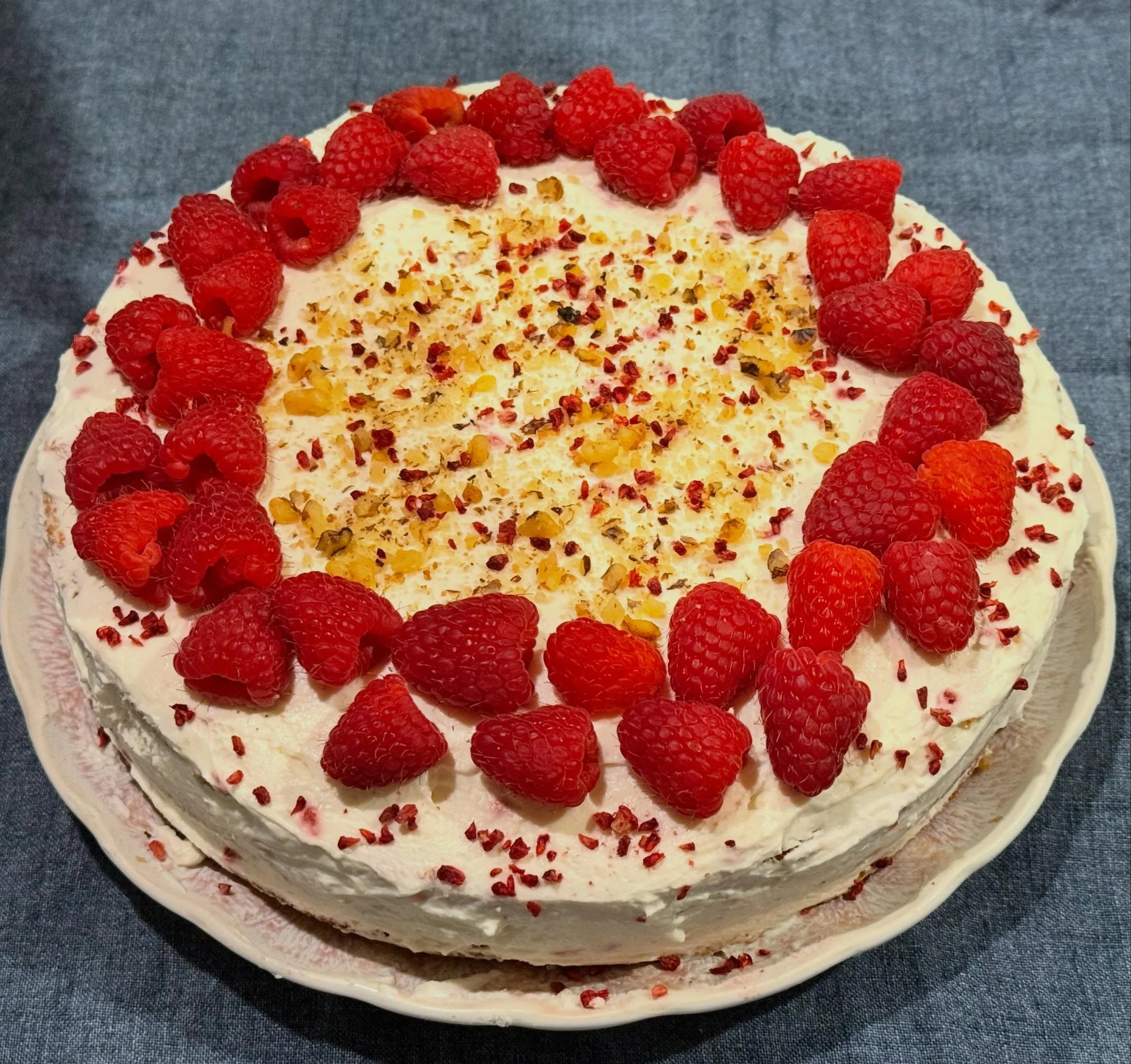 Layered cake with raspberries, walnuts, and mascarpone-based frosting, my go-to treat when I feel a bit down. This spring has been stressful, with particularly aggressive allergies and everything in the news. Hence, I bake. Makes me feel instantly be