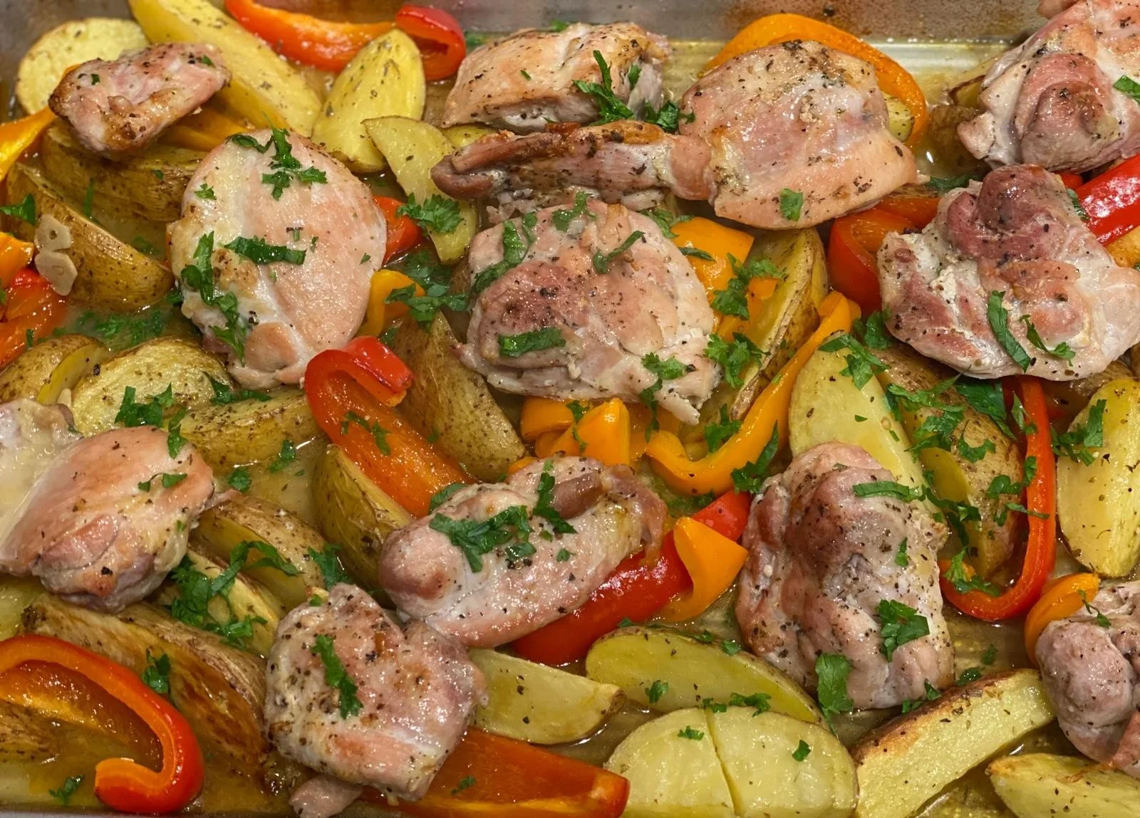 Roasted chicken with potatoes and peppers