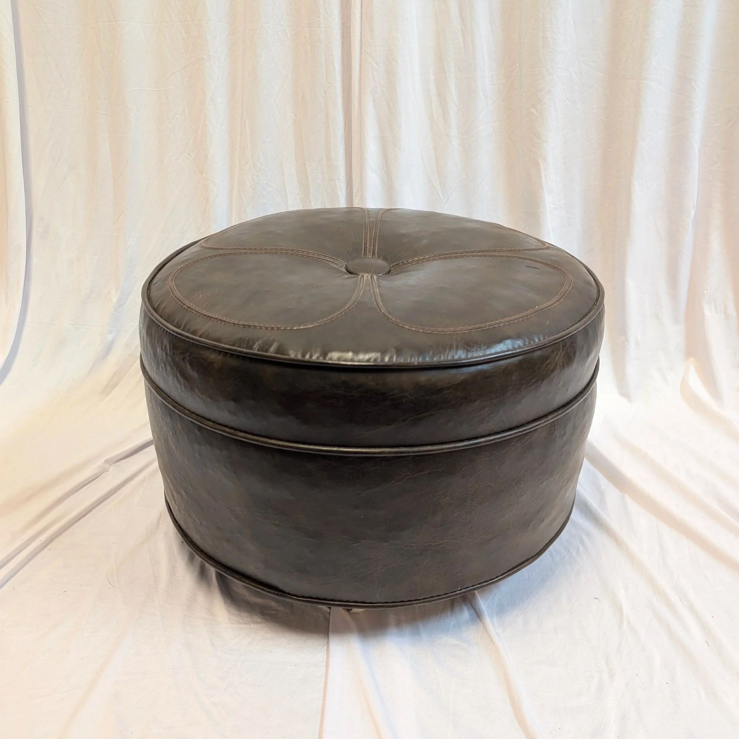 Leather+Pouf+Wheels.jpg