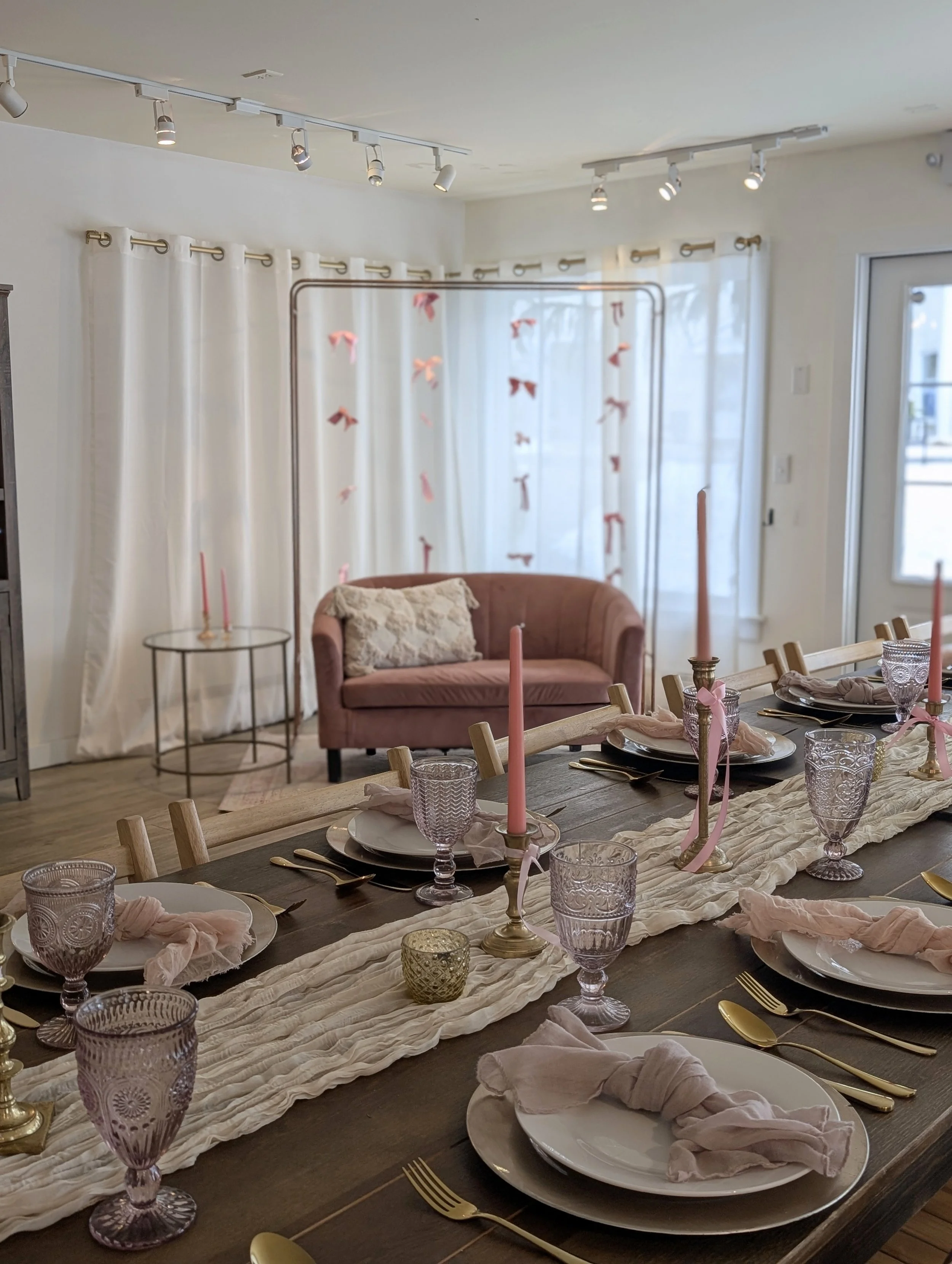 event space stevie copper arch pink bows.jpg