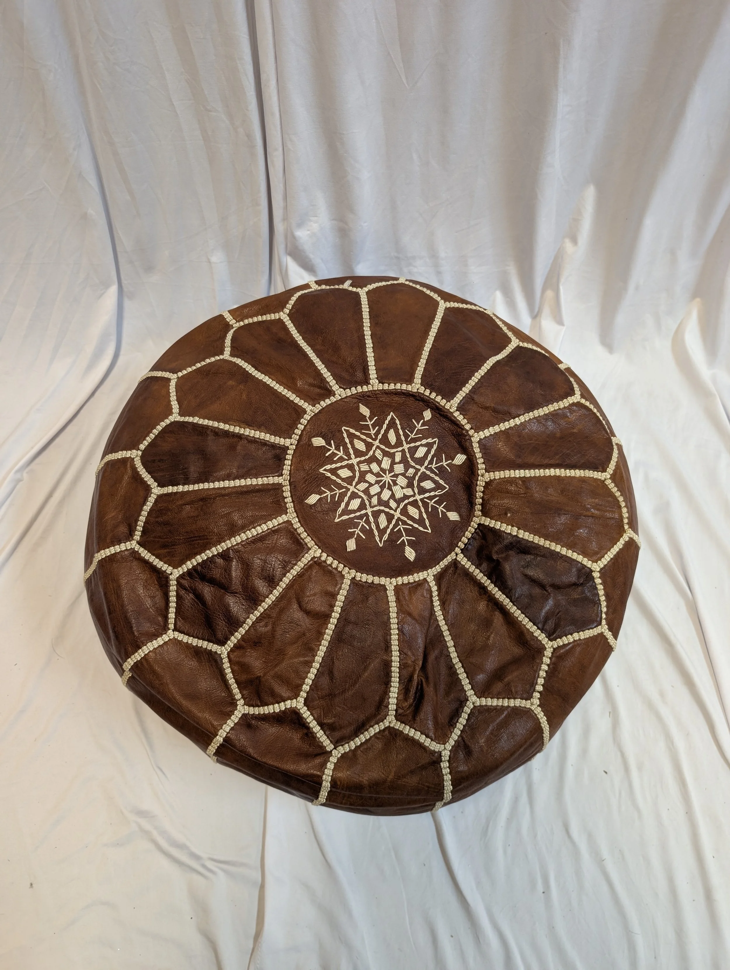 Brown Leather Pouf 1.jpg