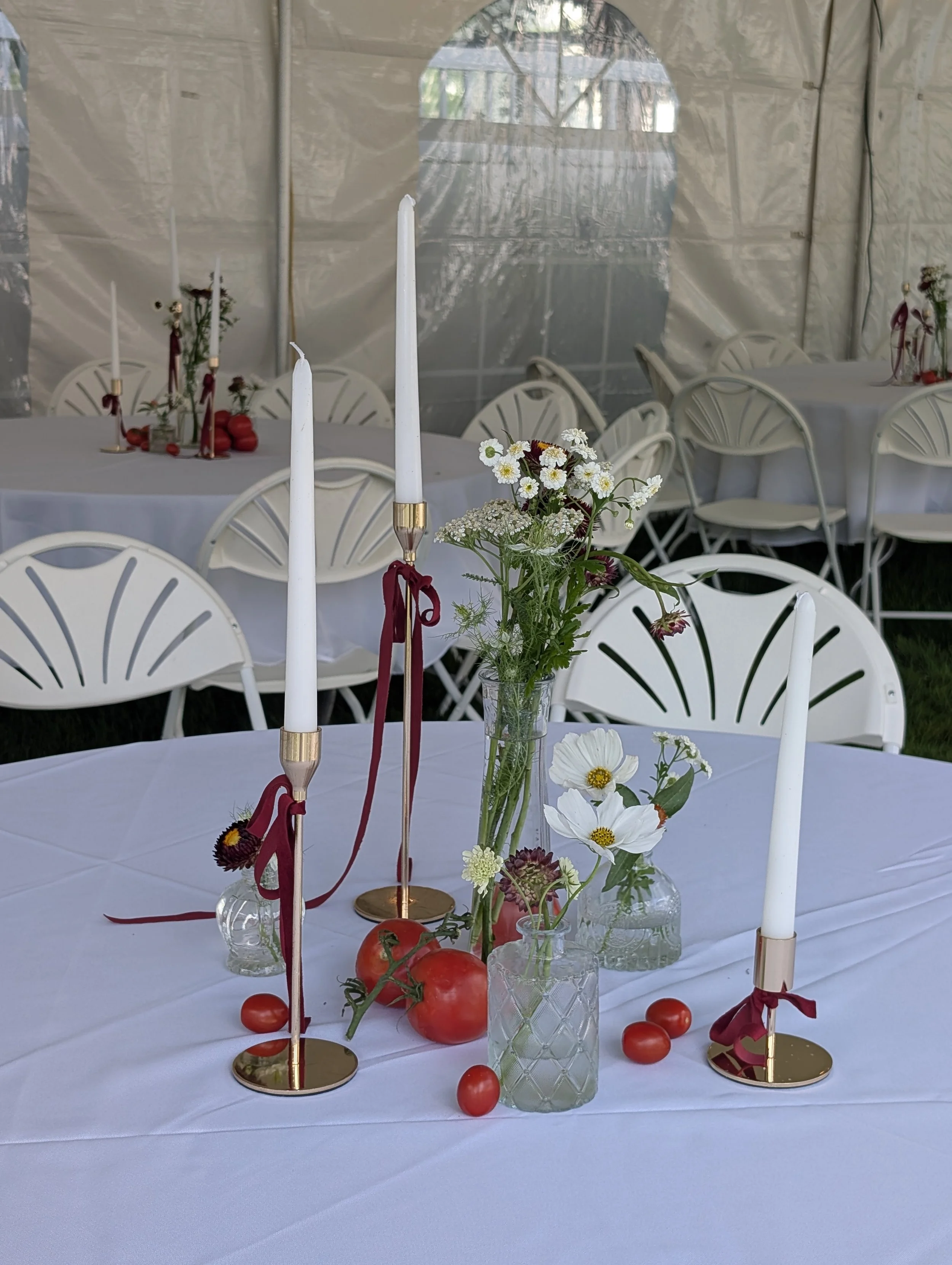 Thats Amore centerpiece candles bows bud vases.jpg