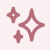 Simple pink female gender symbol with a starburst effect.