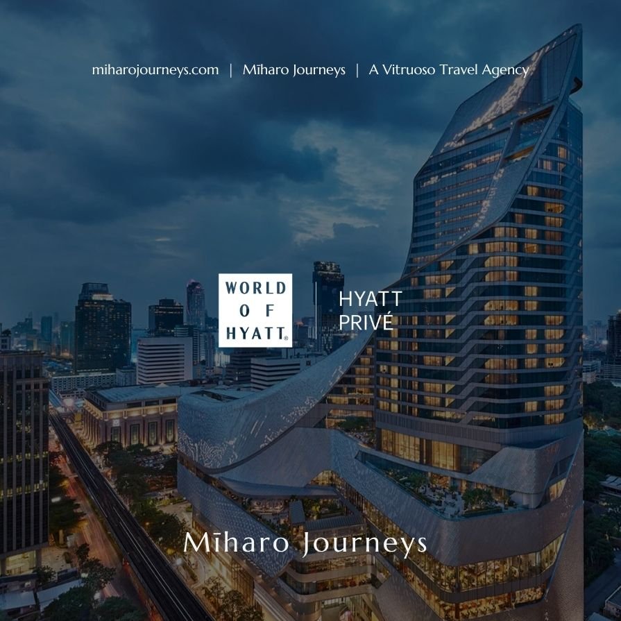 View of a modern city skyline at dusk featuring the Hyatt Privé hotel with a unique twisting architectural design, tall buildings, and city lights.