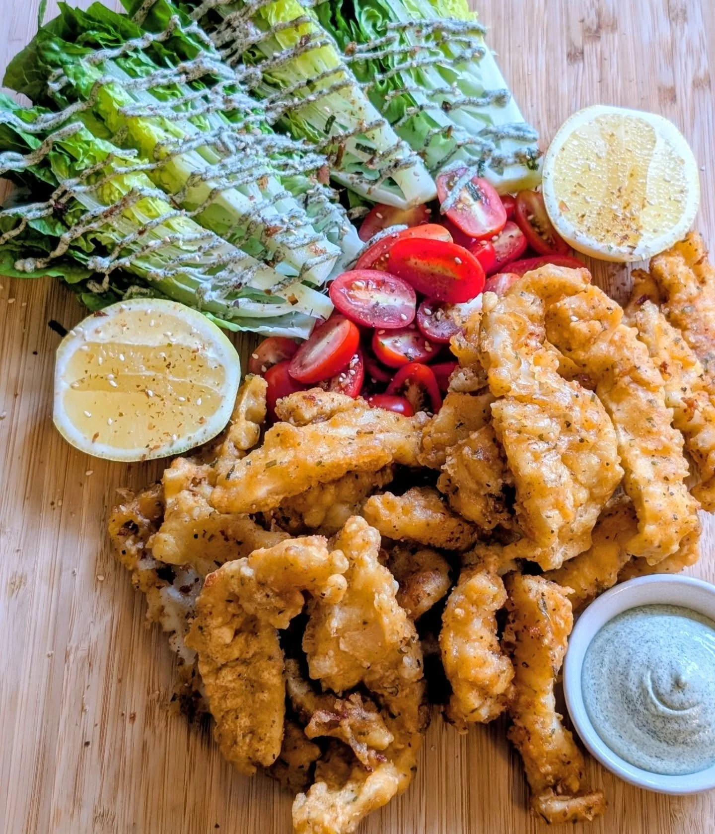 Just in: Our mouth-watering Squid in beer batter with Nori Mayo, served with a refreshing side of Baby Cos lettuce and Cherry tomatoes! 

At Artisan Meals Company, we're passionate about delivering unique dining experiences, that is why you won't eat