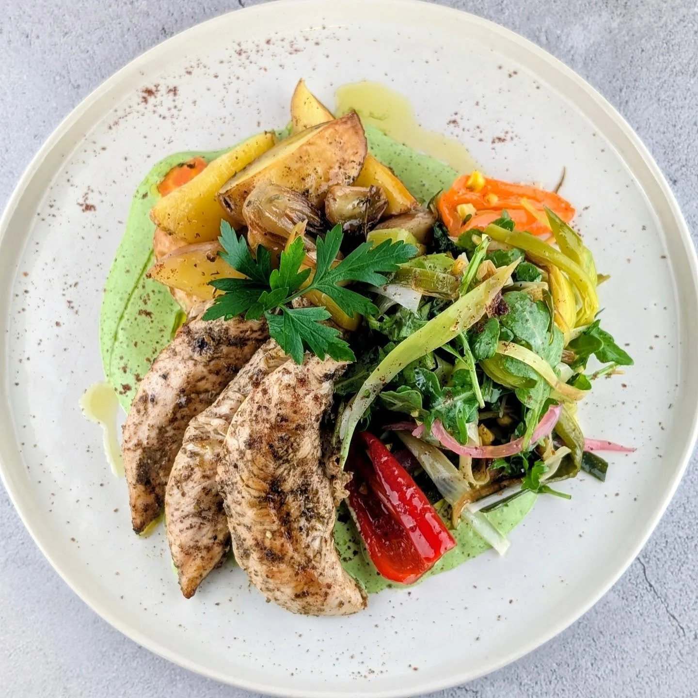 Grilled herbs &amp; spices Chicken Tenderloins served on a bed of Green yoghurt dressing with roasted carrots and potatoes and charred grilled leek &amp; rocket salad 

This is what restaurant-quality looks like at home.
At Artisan Meals Company, we 