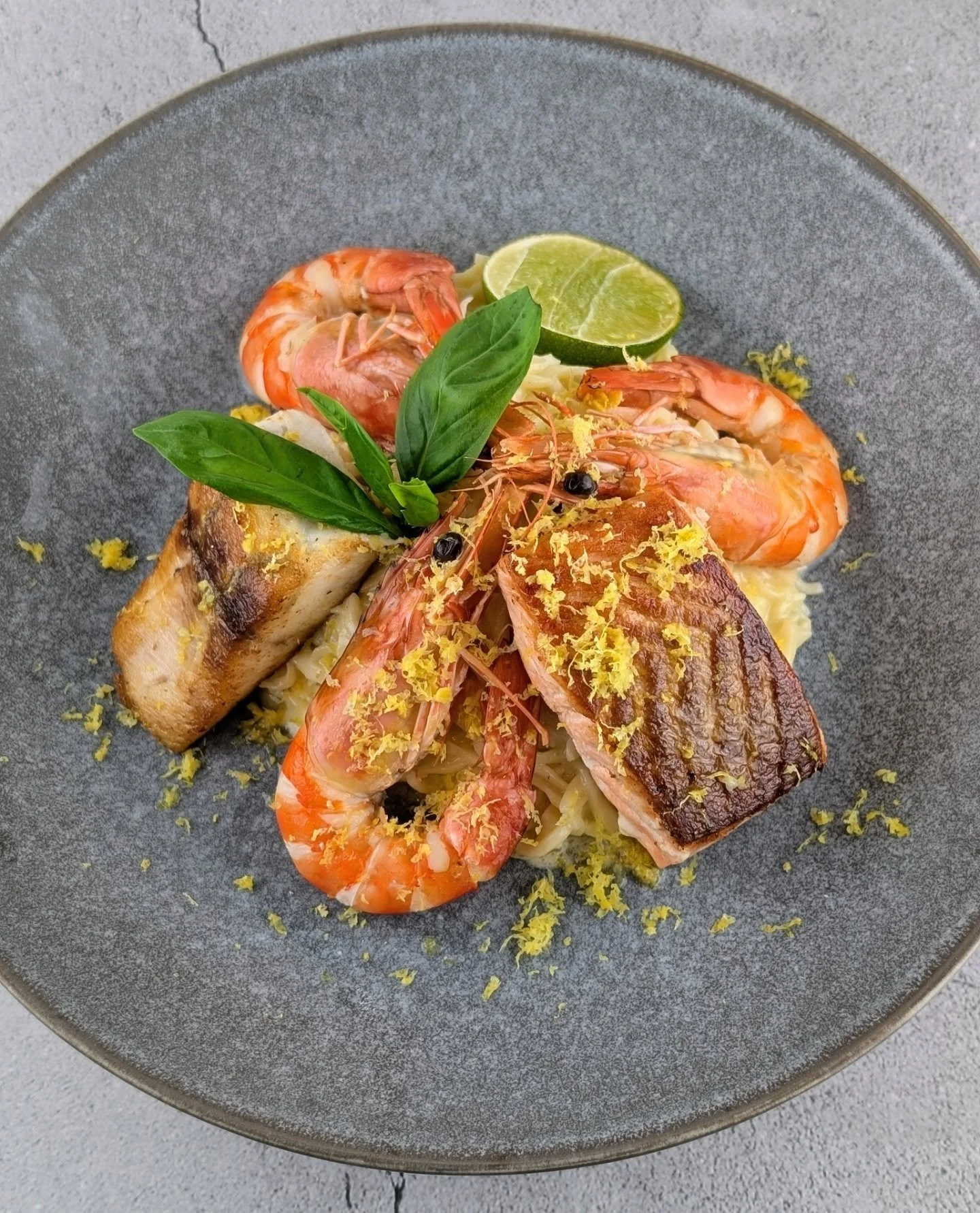 Homemade Spaghetti with a Trio of King Prawns, Salmon &amp; Barramundi served with a creamy lemon sauce &amp; lemon zest.

At Artisan Meals Company, we create fresh, wholesome meals from scratch, made with quality ingredients your family can feel goo