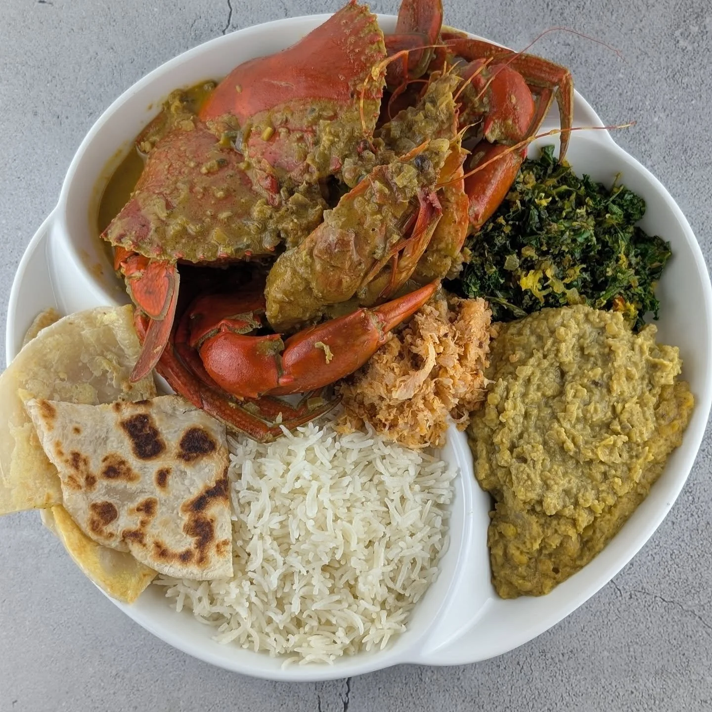 Part 2! Final result of our Sri-Lankan Crab &amp; Prawns Curry served with rice, Mallung, Pol Sambol, Parippu &amp; Paratha.

From gathering premium ingredients, to making everything from scratch even the Parathas, Artisan Meals Company is the go to 