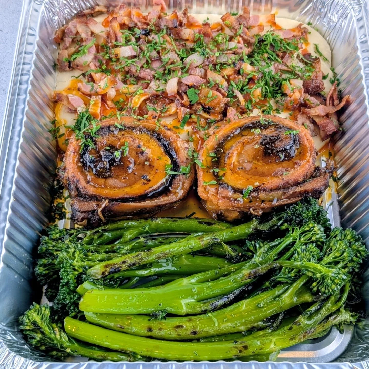 Chilean slow - roasted rolled pork belly served with a Cannellini bean puree topped with sauteed Guanciale and grilled Broccolini.

At Artisan Meals Company, we create fresh, wholesome meals from scratch, made with quality ingredients your family can