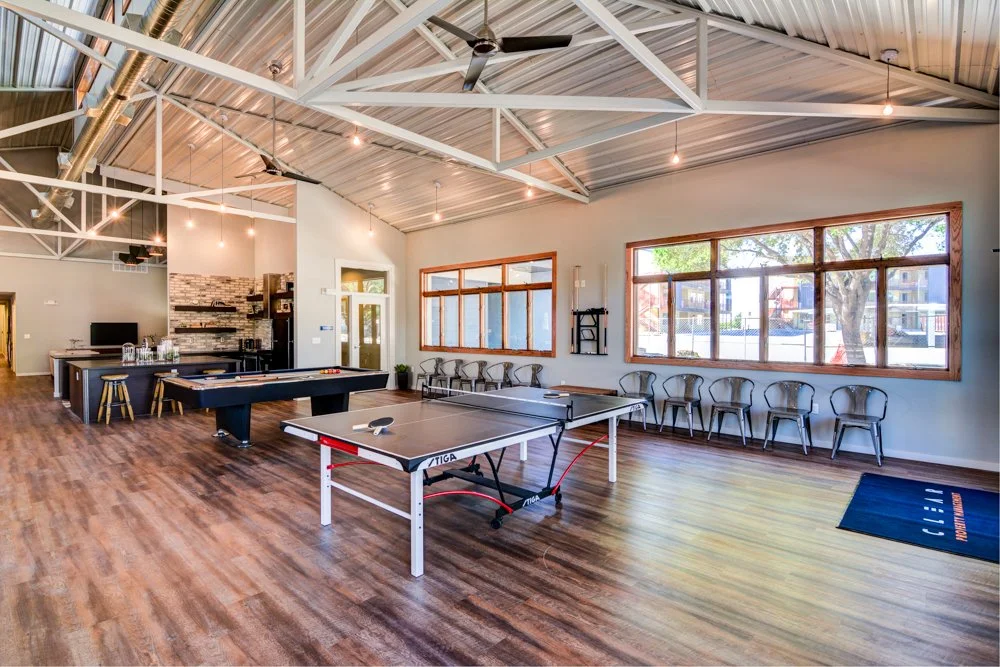 Image example of a rustic olive color Vacuubond LVT® brand LVT flooring installed at an indoor clubhouse.