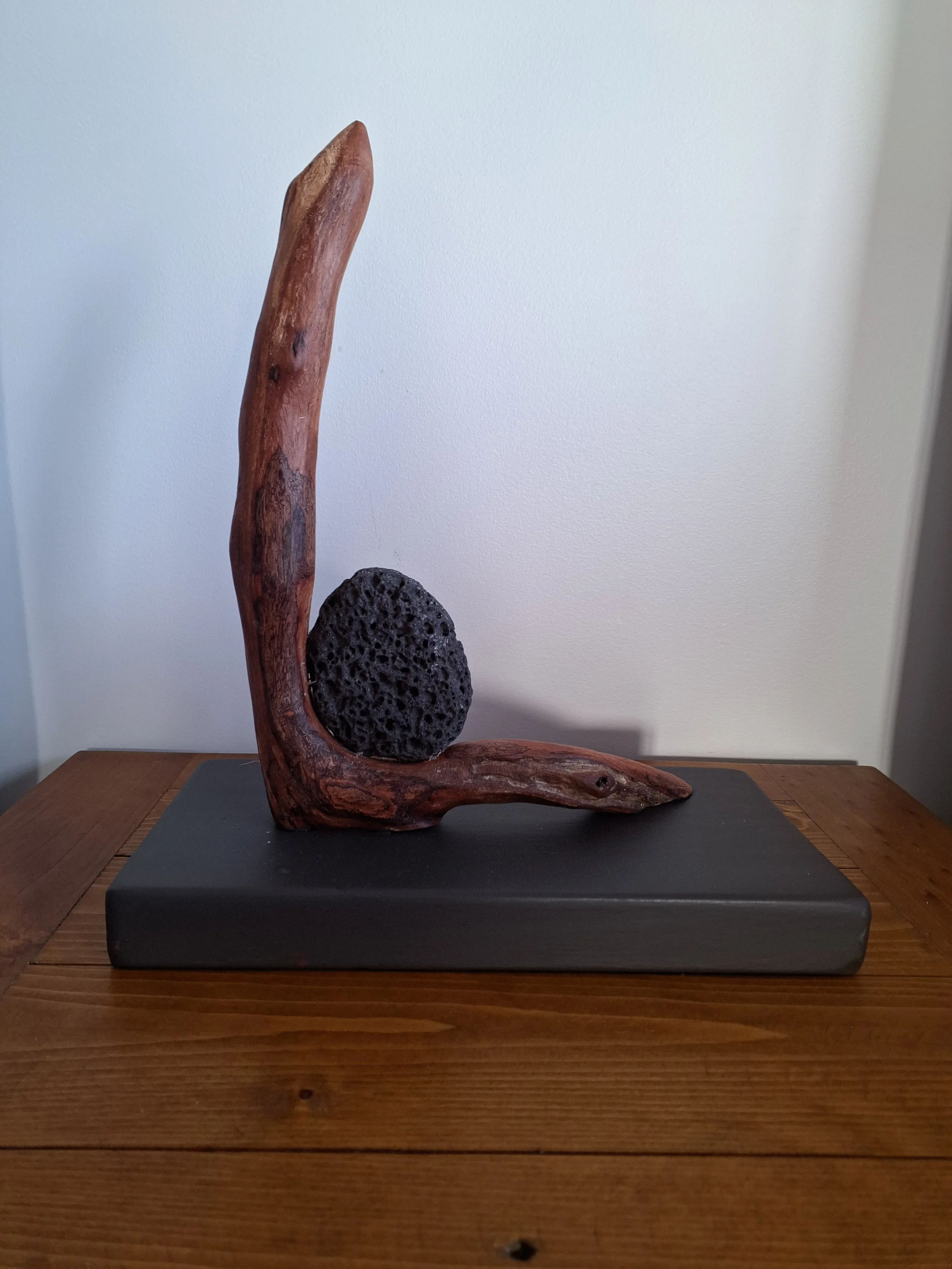 Snake with a Rock, made from found material Muriwai 330mm high
$100.00