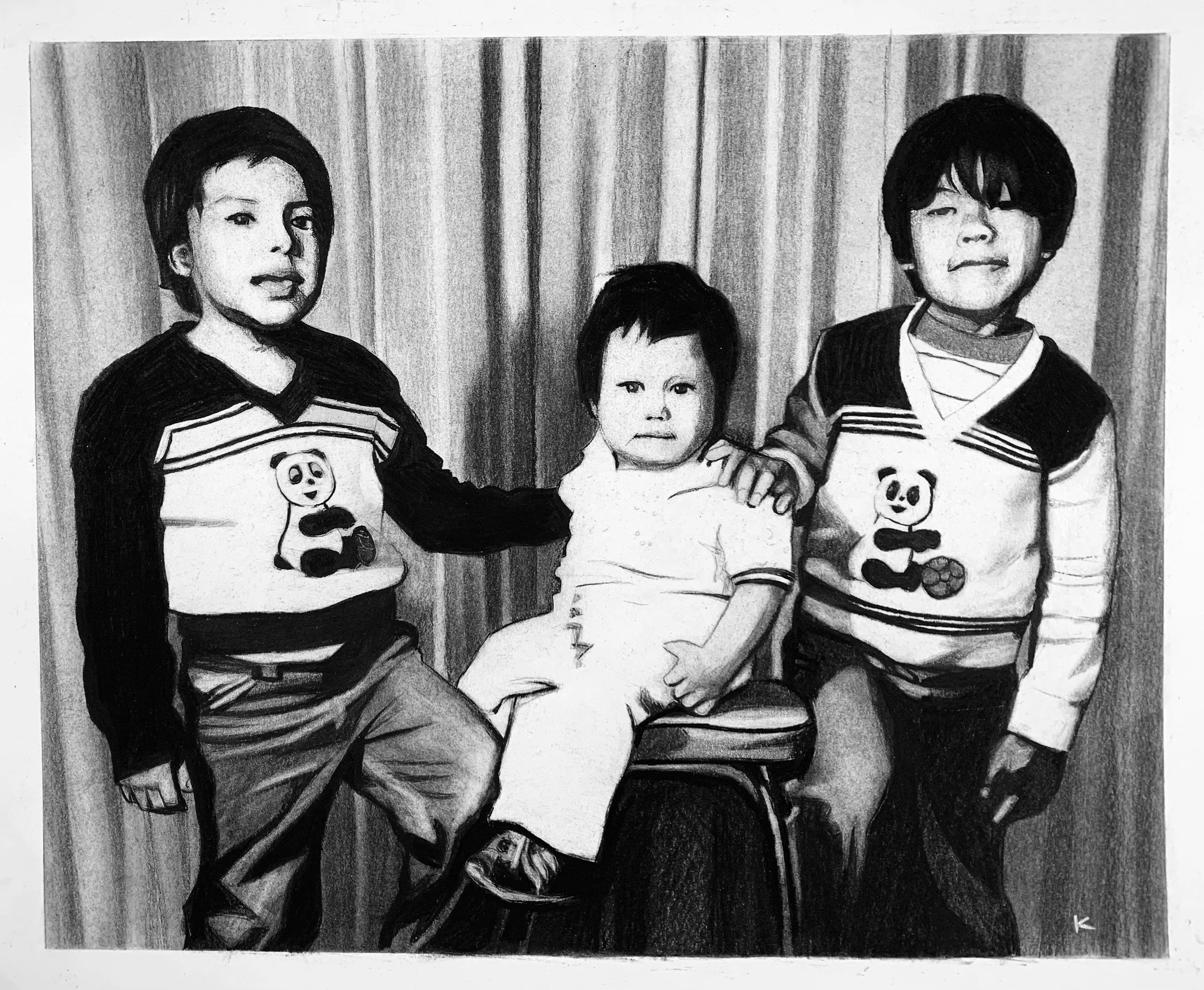 A black and white drawing of three children posing together. The child on the left is standing with one hand on a young child's shoulder, wearing a panda graphic sweatshirt. The young child in the middle is sitting on a chair, wearing a light-colored