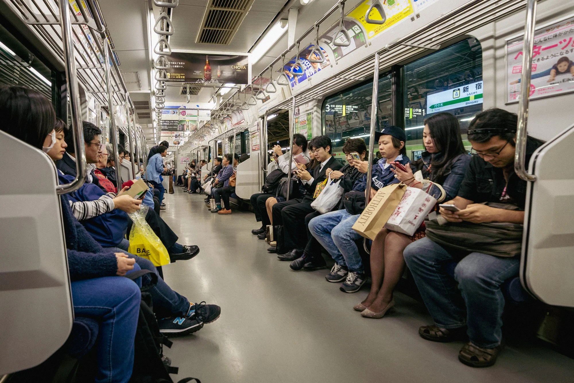 A typical scene aboard a train in Tokyo