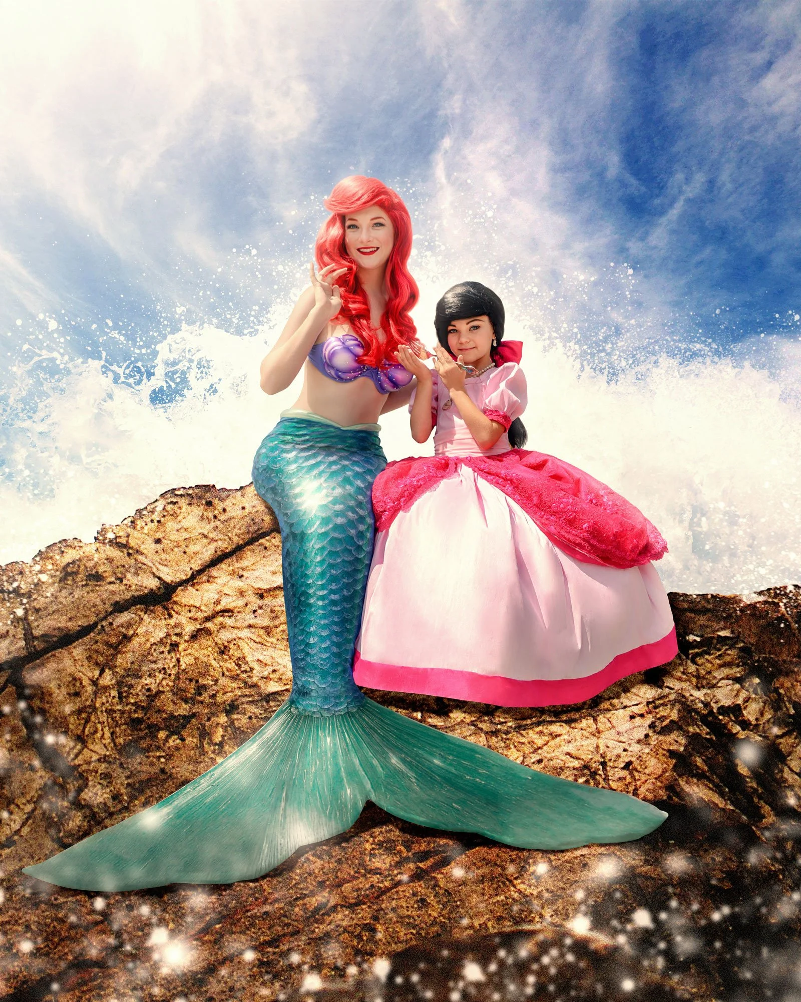Cosplayers dressed as Ariel and Melody from The Little Mermaid