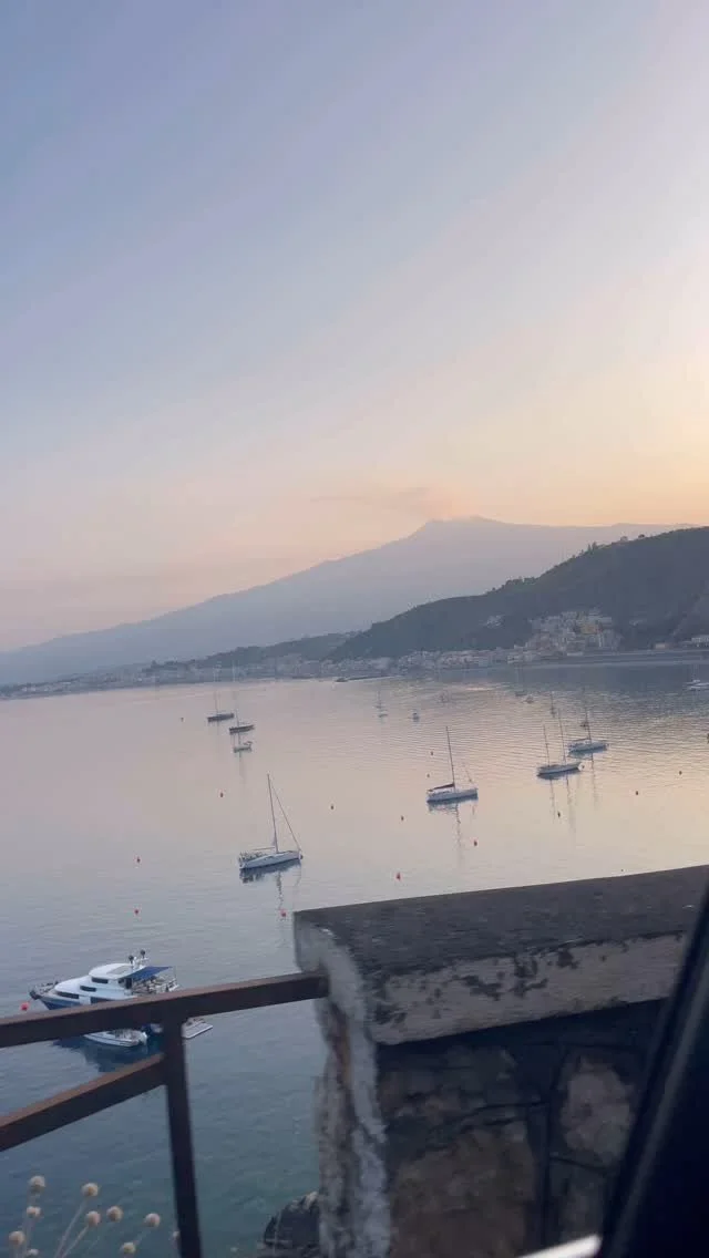 Sicily feels like living in a dream…
Just casually driving to dinner at sunset, overlooking the bay we live in, literally pointing to my apartment and watching Etna erupt a bit above. Pinch me.
#locallifesicily #travelsicily