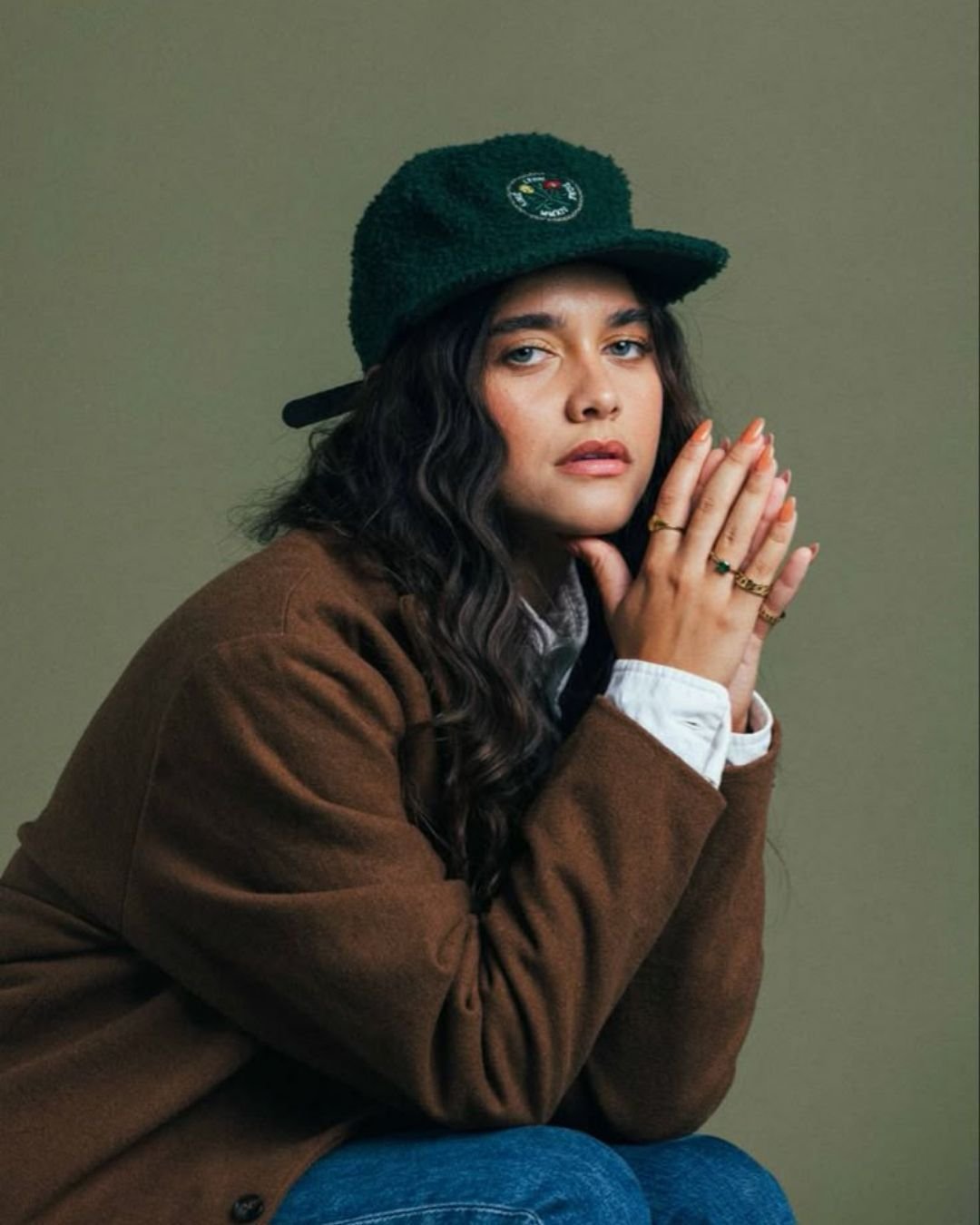 Today, the cap dominates editorials&mdash;from the minimal chic of Lalisa Manobal for Celine, to Julianne Moore&rsquo;s effortless elegance, to Billie Eilish, who made the cap a signature of her androgynous, oversized aesthetic.

It&rsquo;s the unexp