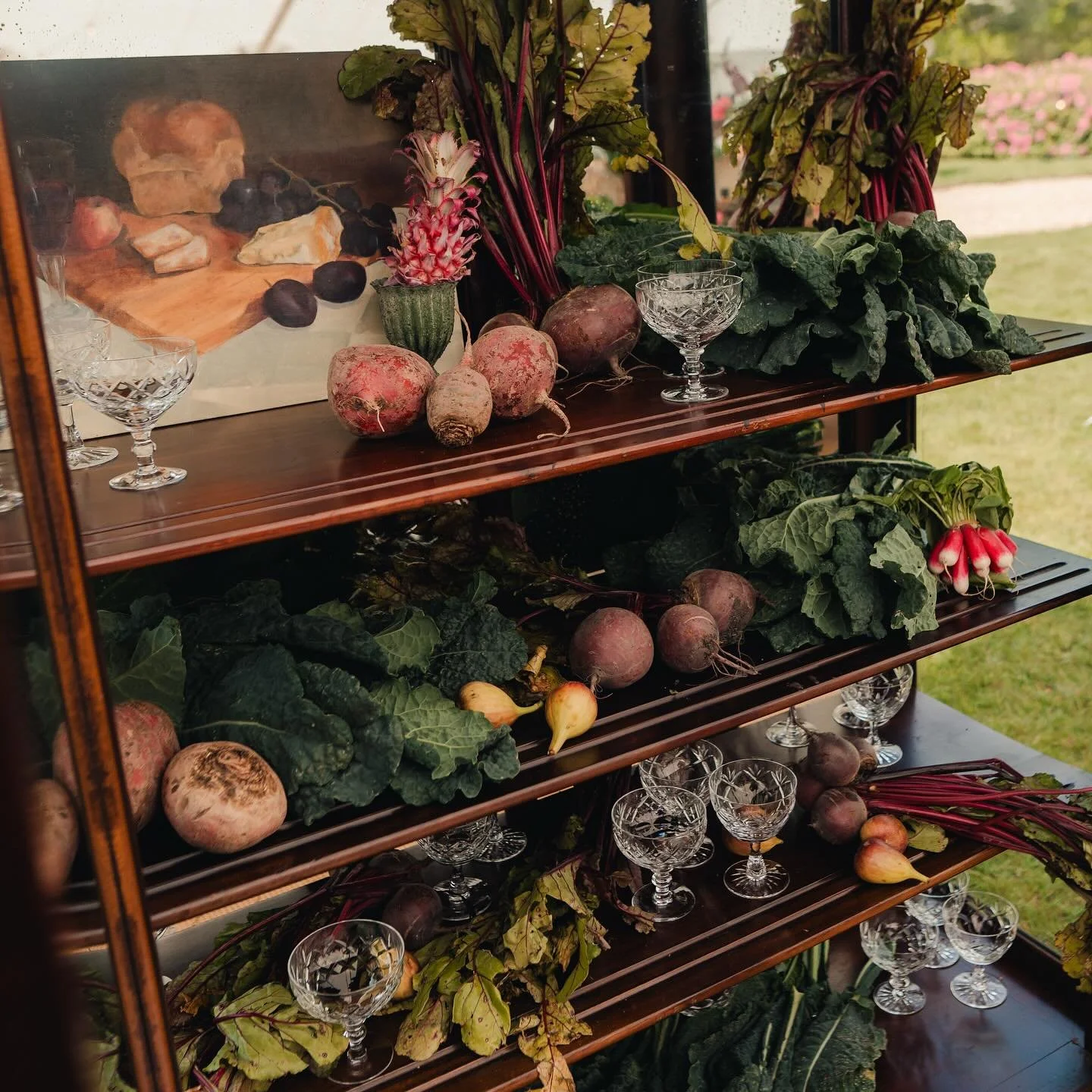 A Champagne curiosity cabinet. Using antique pieces of furniture in your wedding decor, brings charm and delight. Adding an element of the unexpected; when filled with champagne and decorative details. 

We don&rsquo;t just design beautiful weddings,