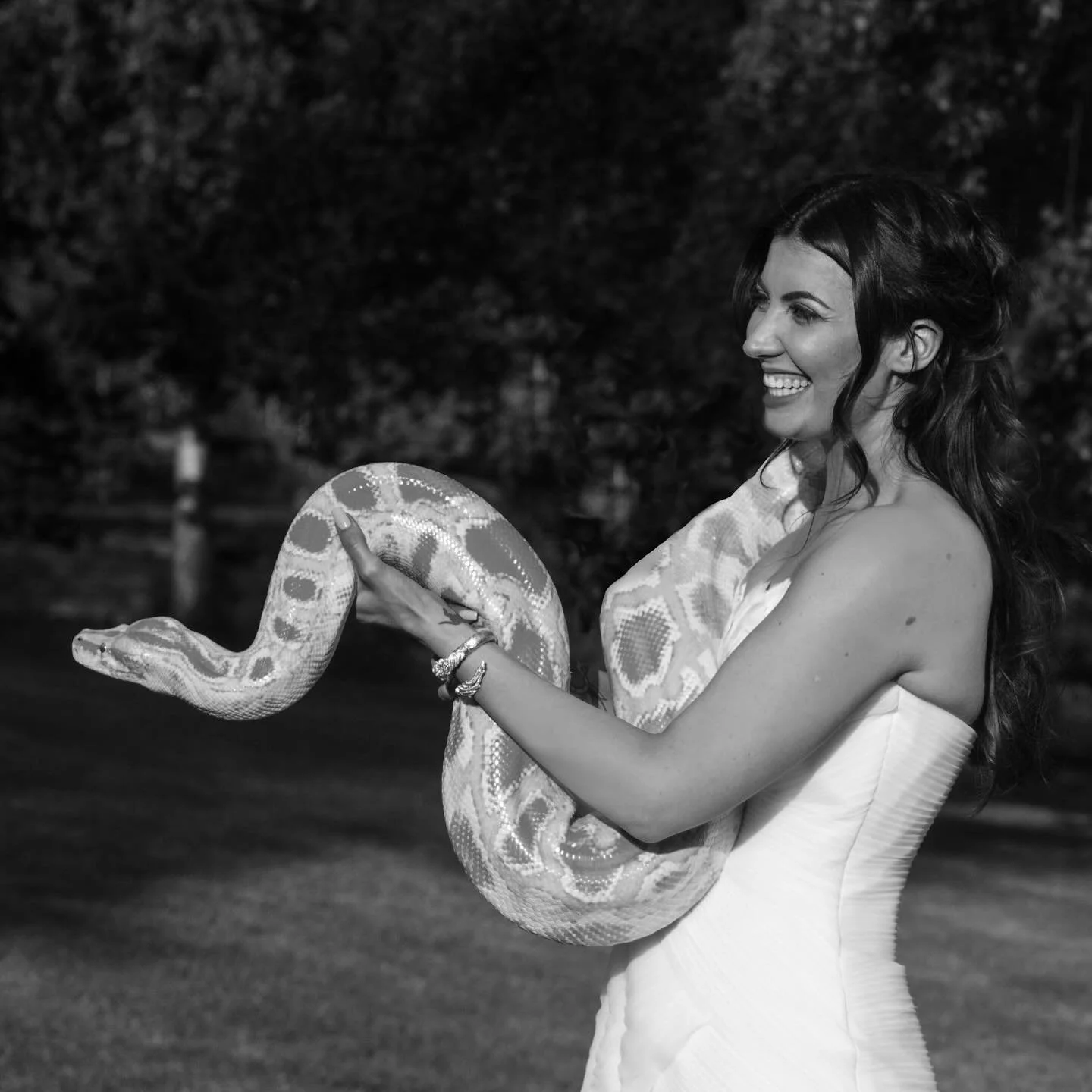 This is me, on my wedding day in 2017! I fell in love with planning in 2015 when I started planning my own wedding day and have adored planning weddings and events ever since. A fun part of our wedding day was a surprise guest: an albino python 🐍🩷