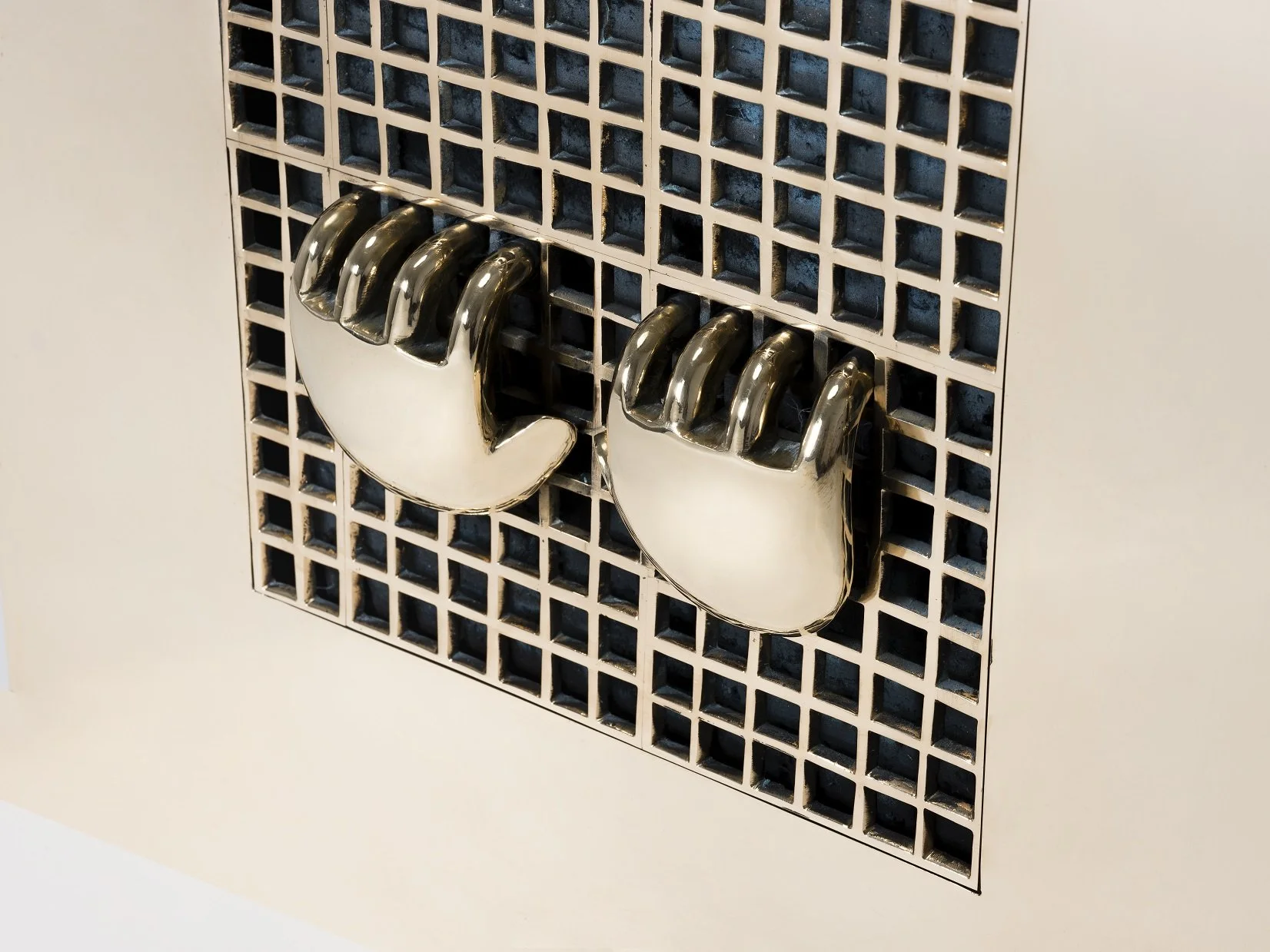 Hand and Cage (2005), Bronze, 62 x 62 x 7 cm