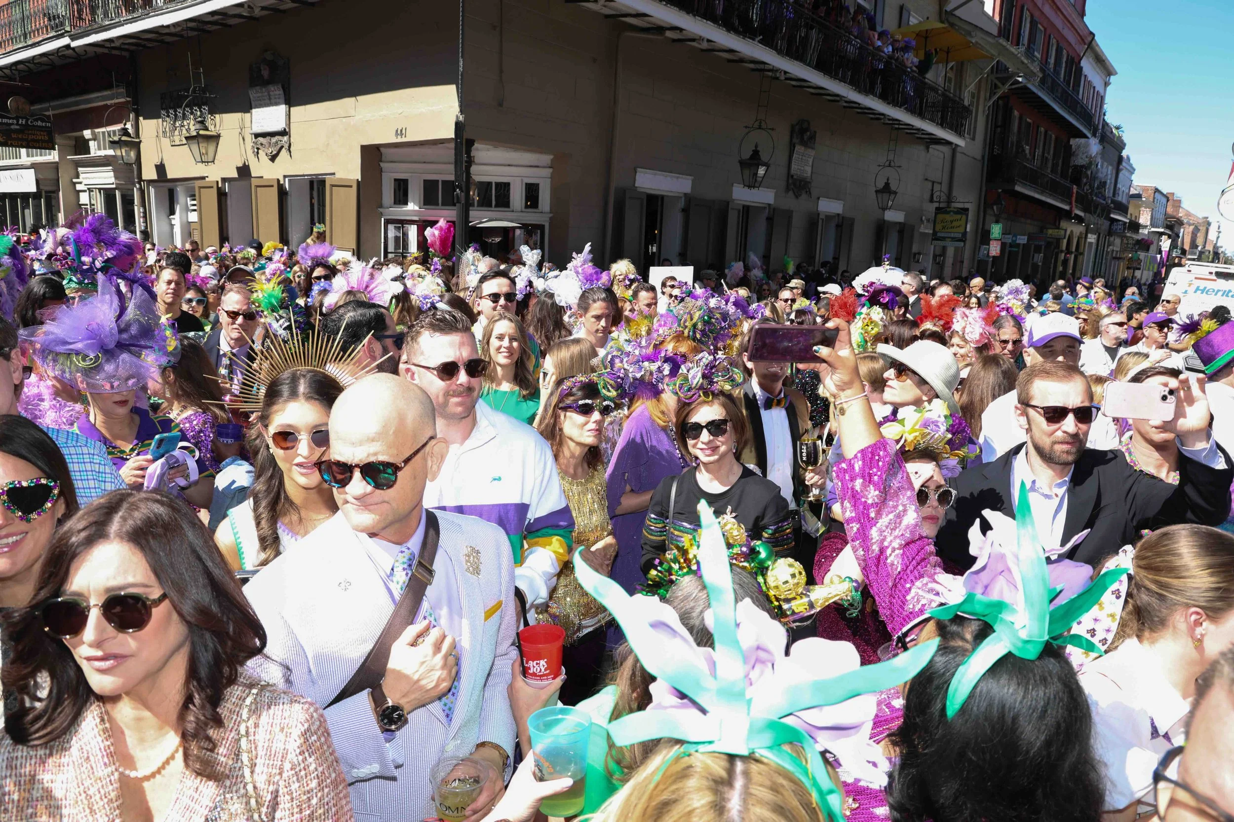 A festive crowd celebrates Hermes Friday in the French Quarter in New Orleans.