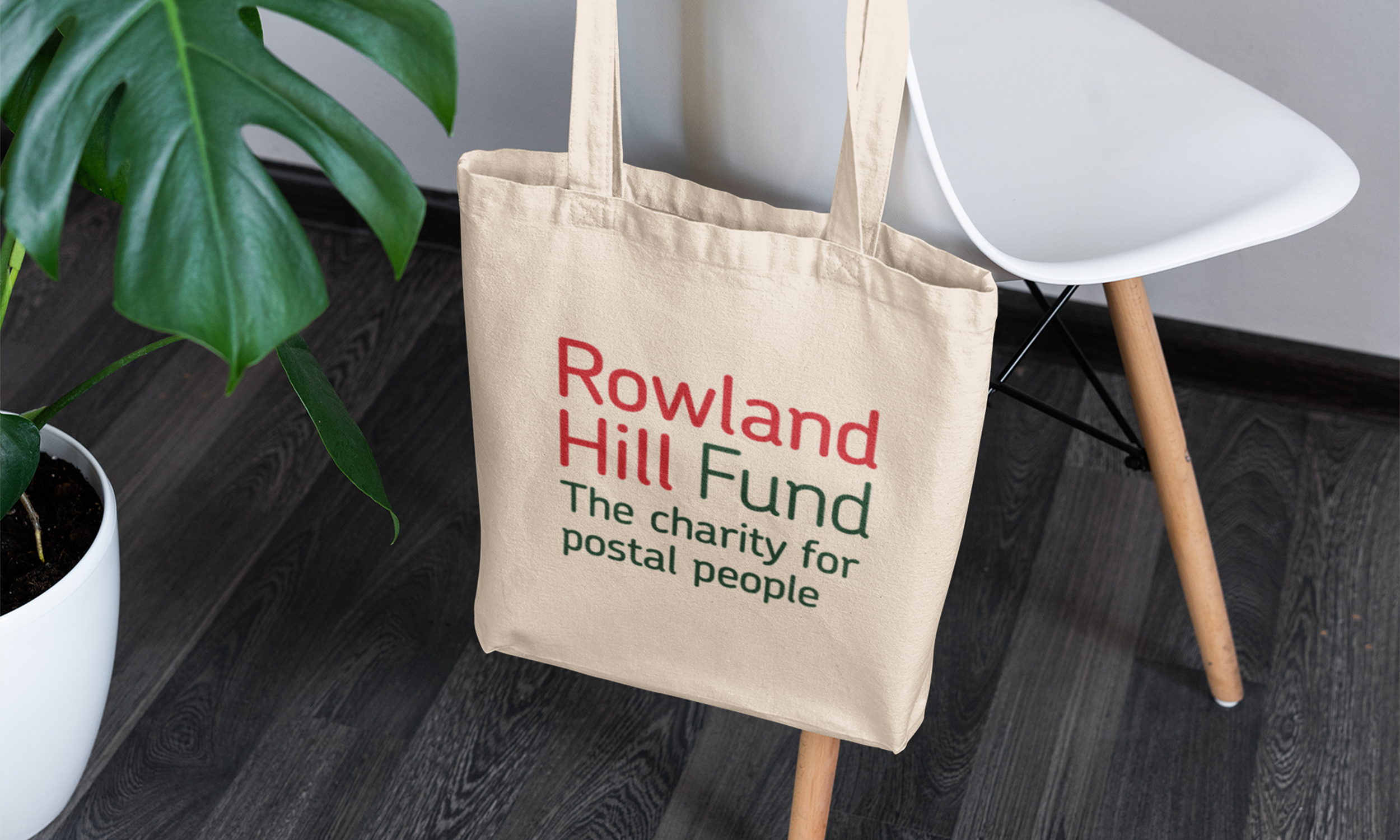 sublimated-tote-bag-mockup-featuring-a-modern-chair-and-a-plant-3149-el1.png