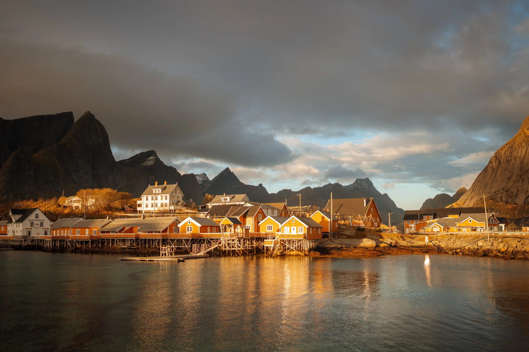 Traditional red fishing cabins in Reine, Lofoten Norway