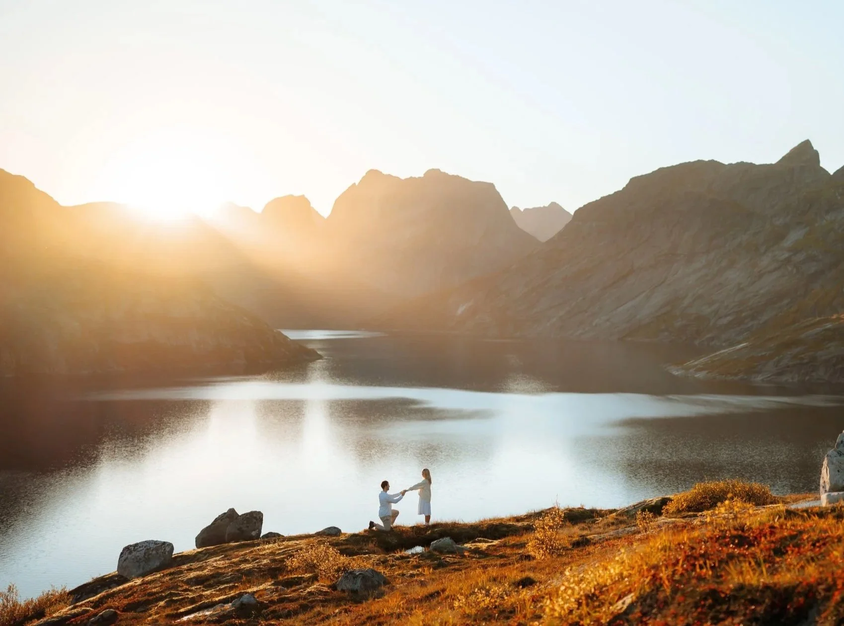 Sunset surprise proposal in Lofoten mountains