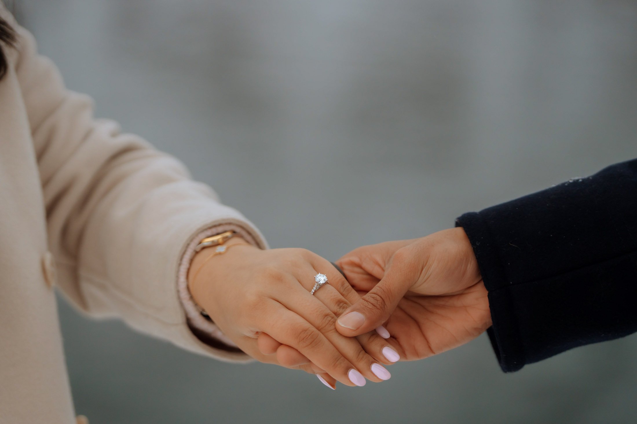 Couple getting engaged and showing a ring Lofoten