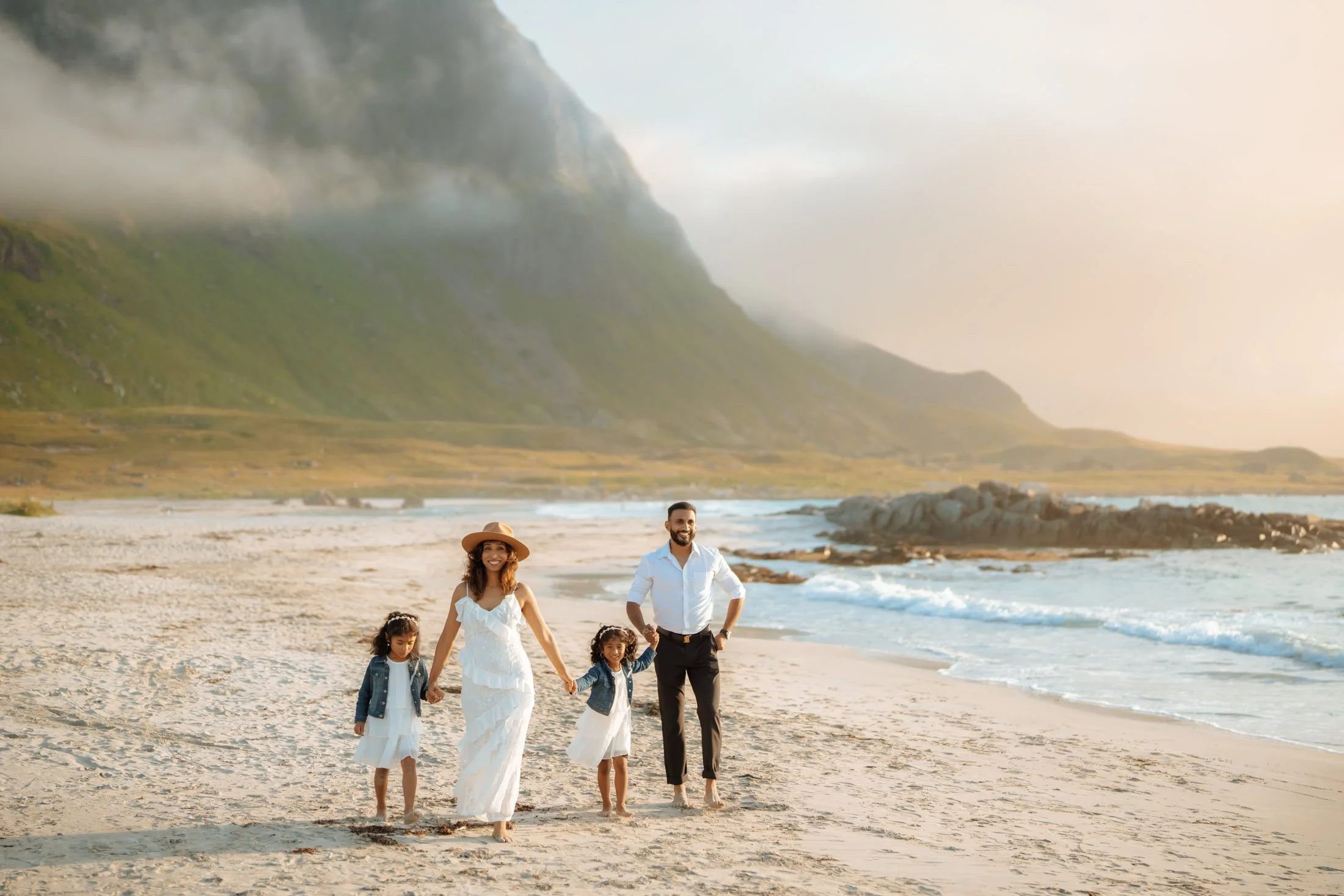 Family enjoying outdoor photoshoot in Lofoten mountains