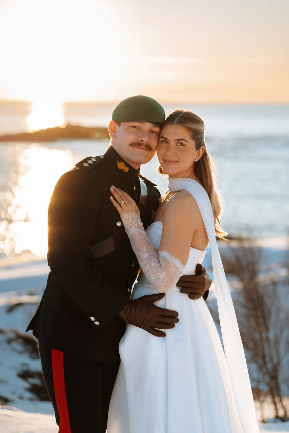 Sunrise elopement in Lofoten with mountain backdrop