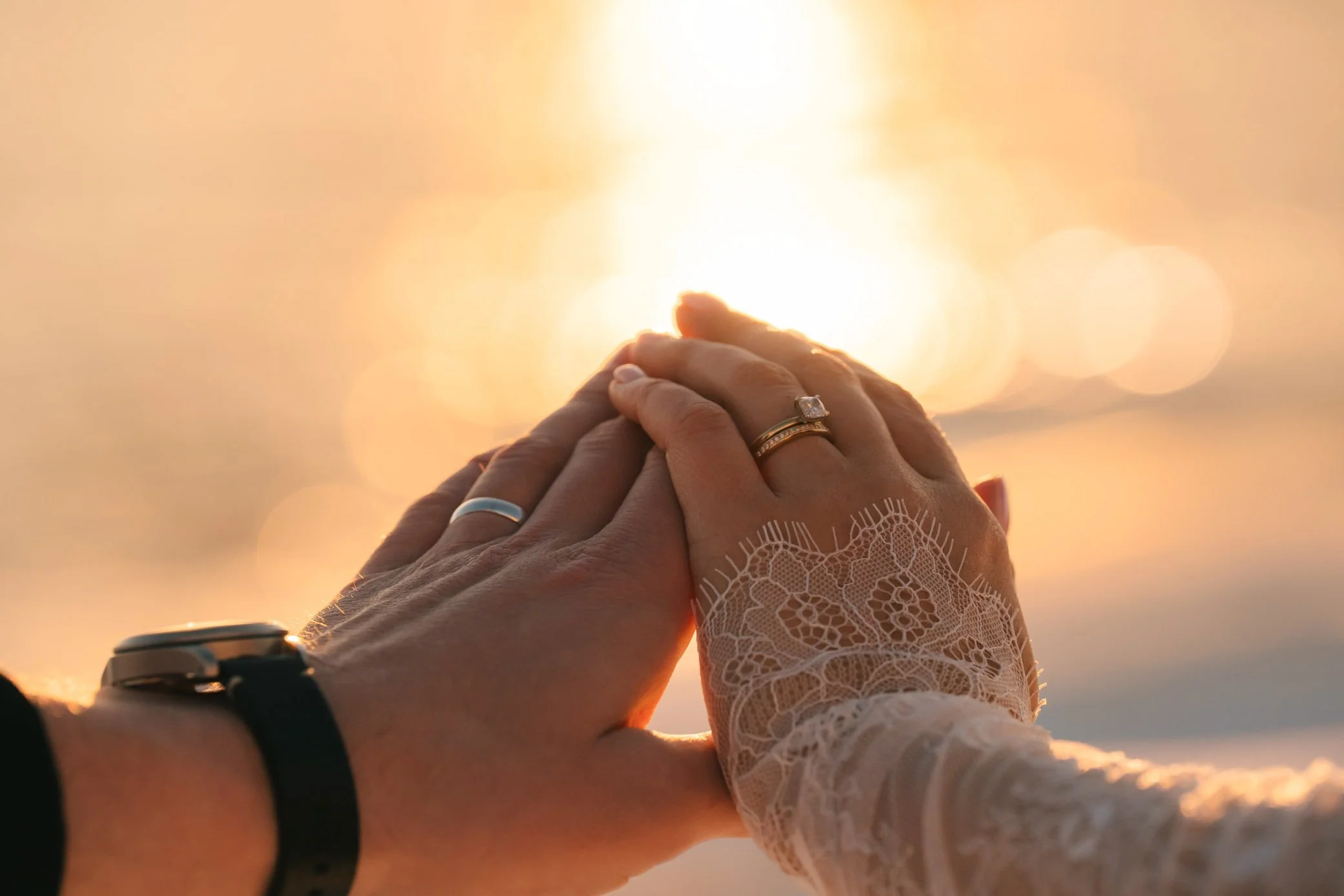 Close-up of couple holding hands during elopement in Lofoten Norway