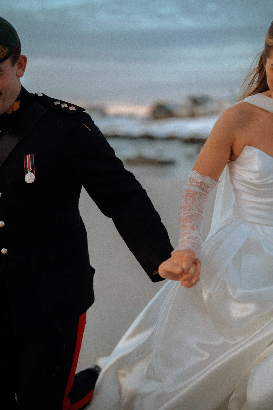 Couple eloping on scenic beach in Lofoten