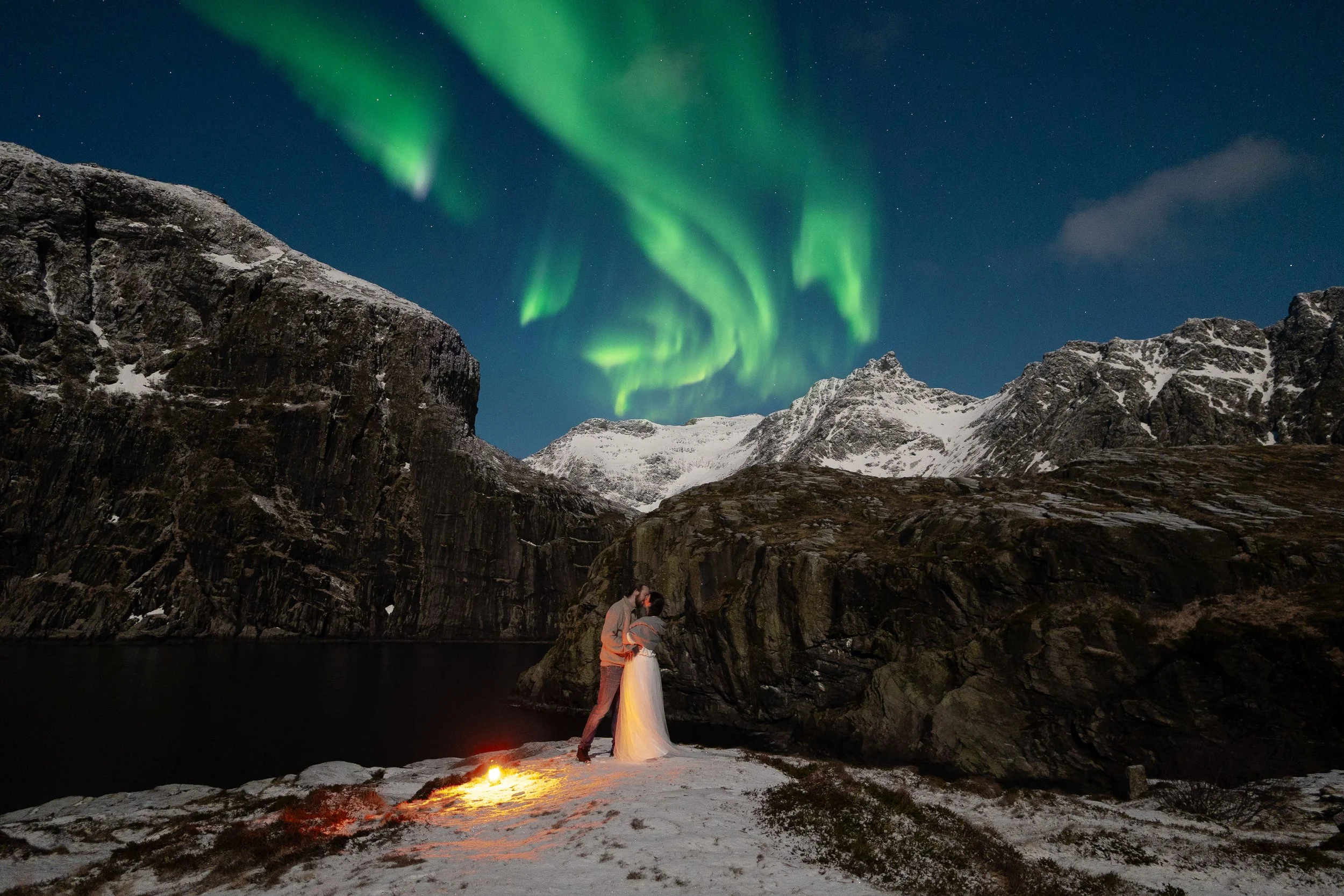 Winter wedding couple under the northern lights in Lofoten Norway during an Arctic elopement