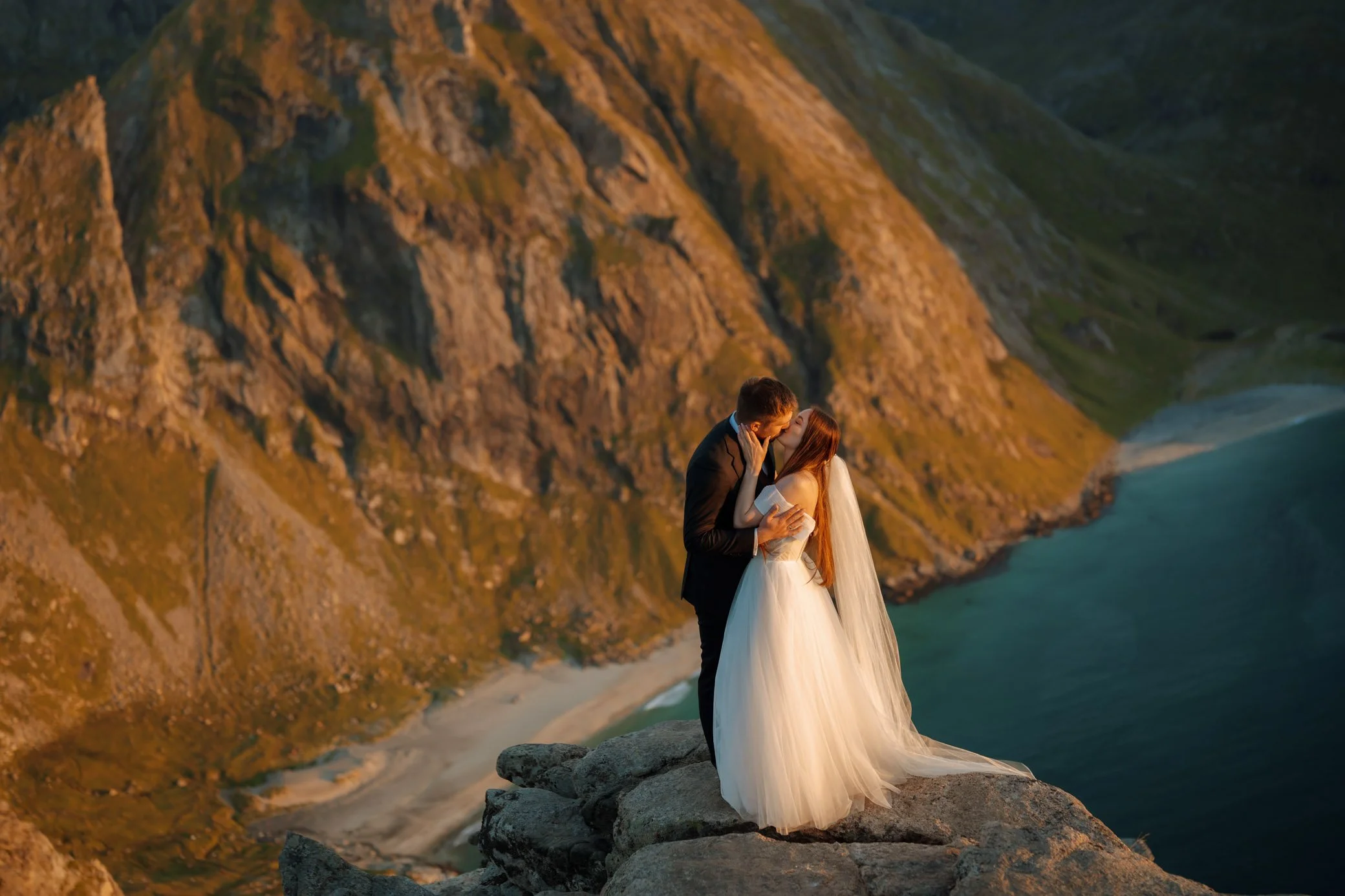 Couple during golden hour on Ryten mountain 