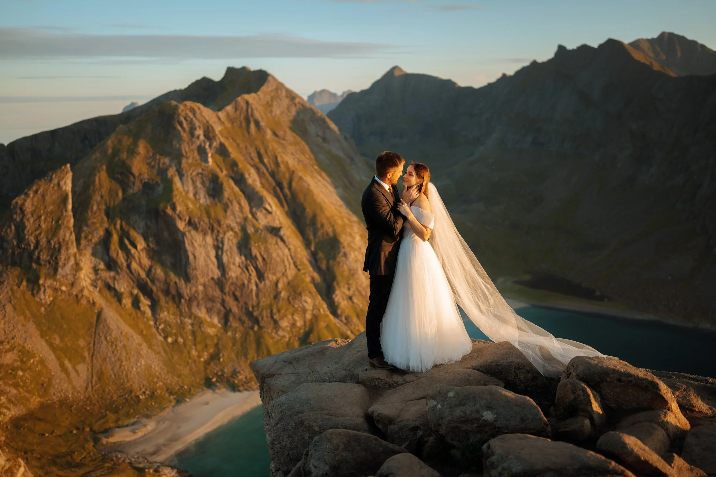 Elopement couple in mountains top in Lofoten, Northern Norway