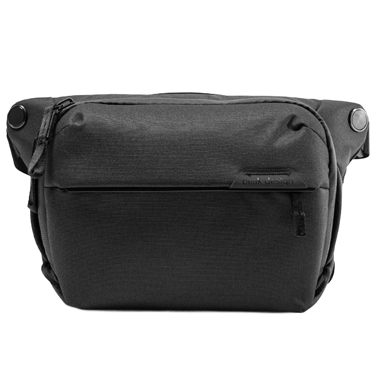 Black Peak Design camera or accessory bag with zipped compartments and metal snap buttons on sides.