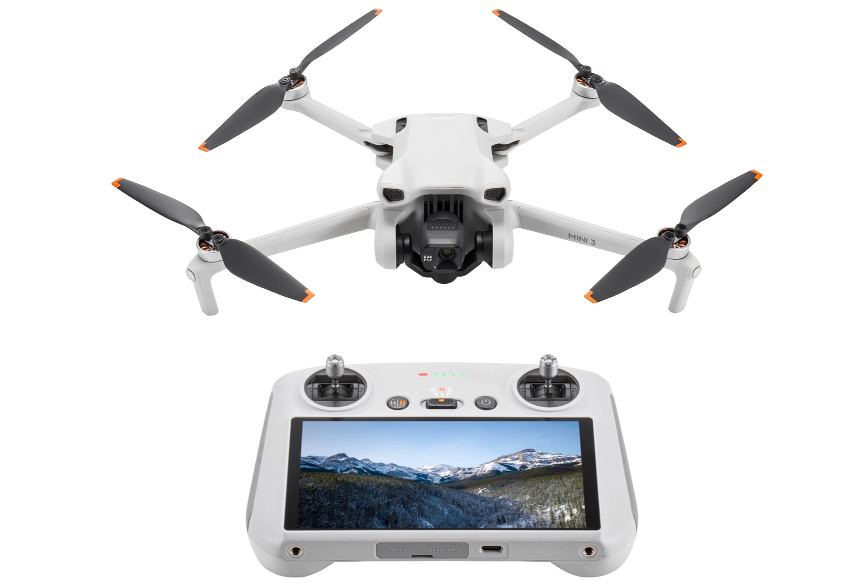 A DJI Mini 3 drone with a white remote controller showing a landscape on its screen, featuring snow-capped mountains and a forest.