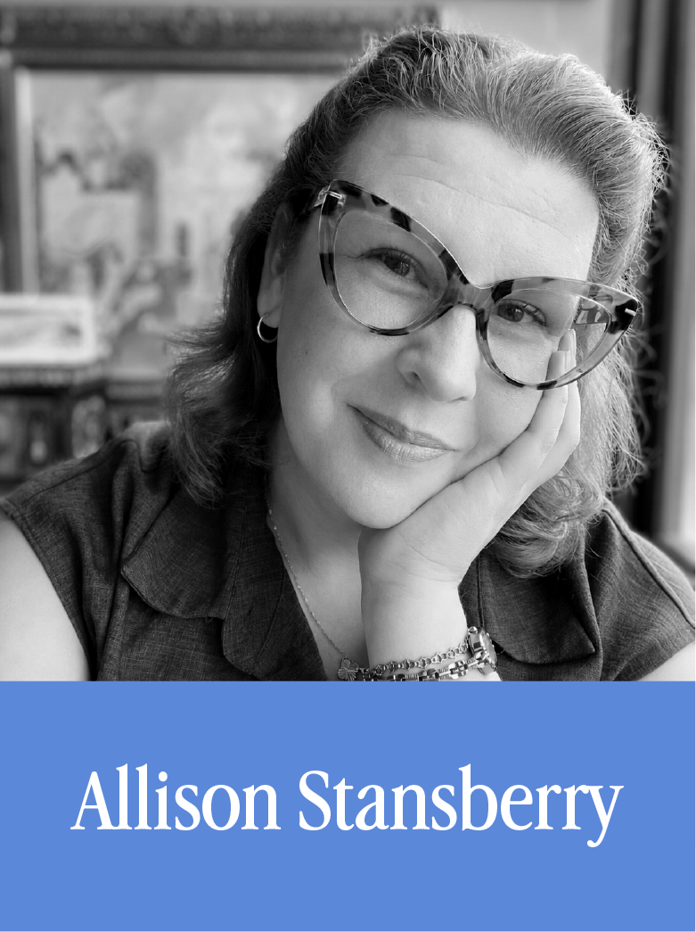 Black and white photo of a woman with glasses resting her face on her hand, smiling gently, with a blurred bookshelf in the background. Blue banner with white text below reads "Allison Stansberry."