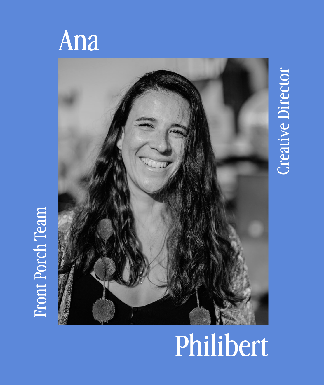 Black and white portrait of a smiling woman with long wavy hair, wearing a necklace and a patterned top, with text indicating her name as Philibert and her roles as part of the Front Porch Team and Creative Director.