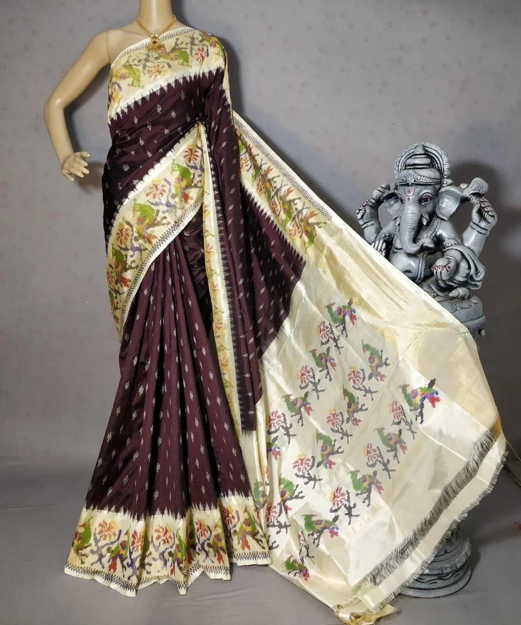 Brown Handloom Double Ikkat Silk Sarees with unstitched blouse material.