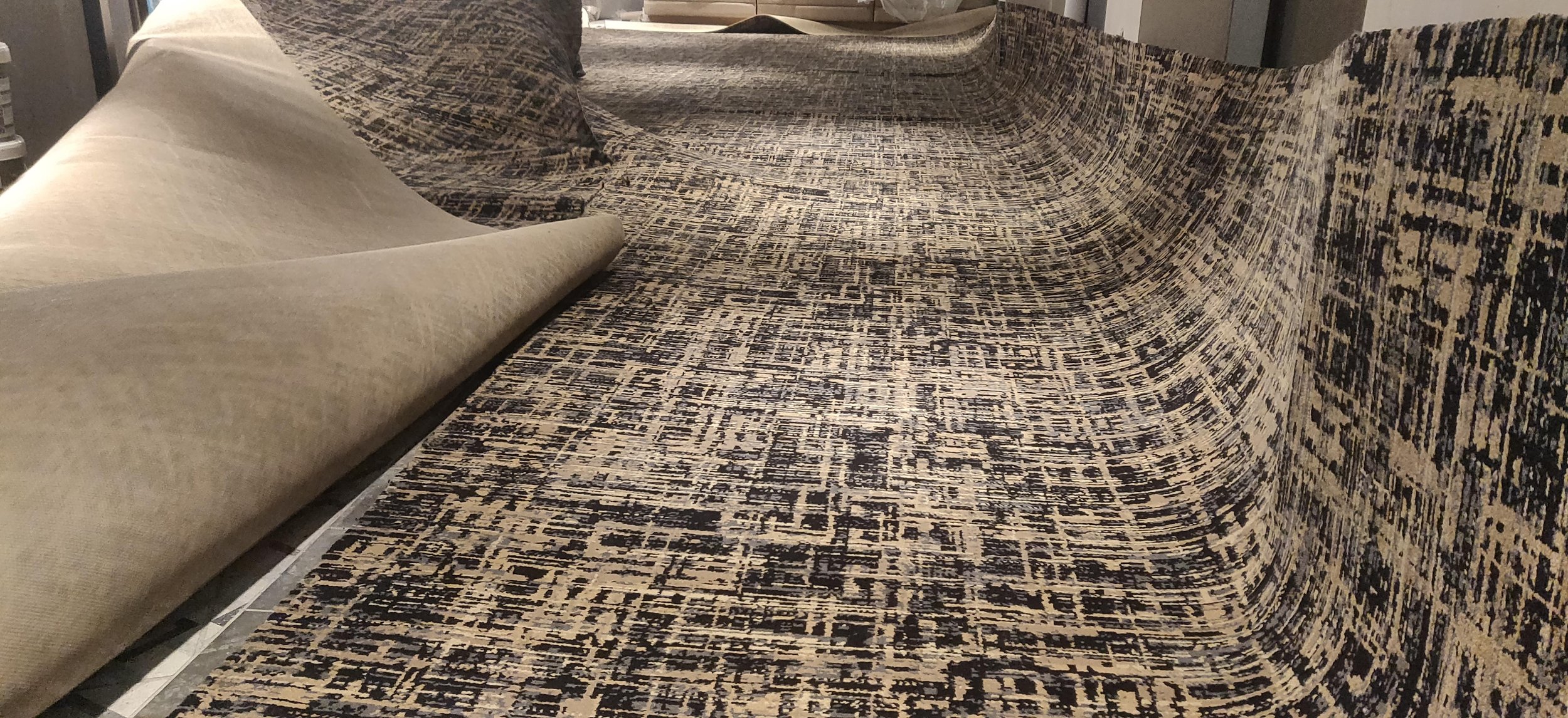 Oranssi technician working on a roof project