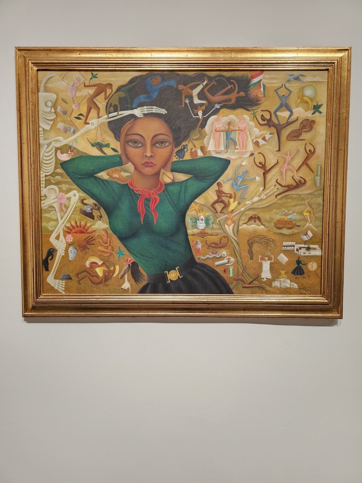 A colourful framed artwork depicting Frida Kahlo at the exhibition.