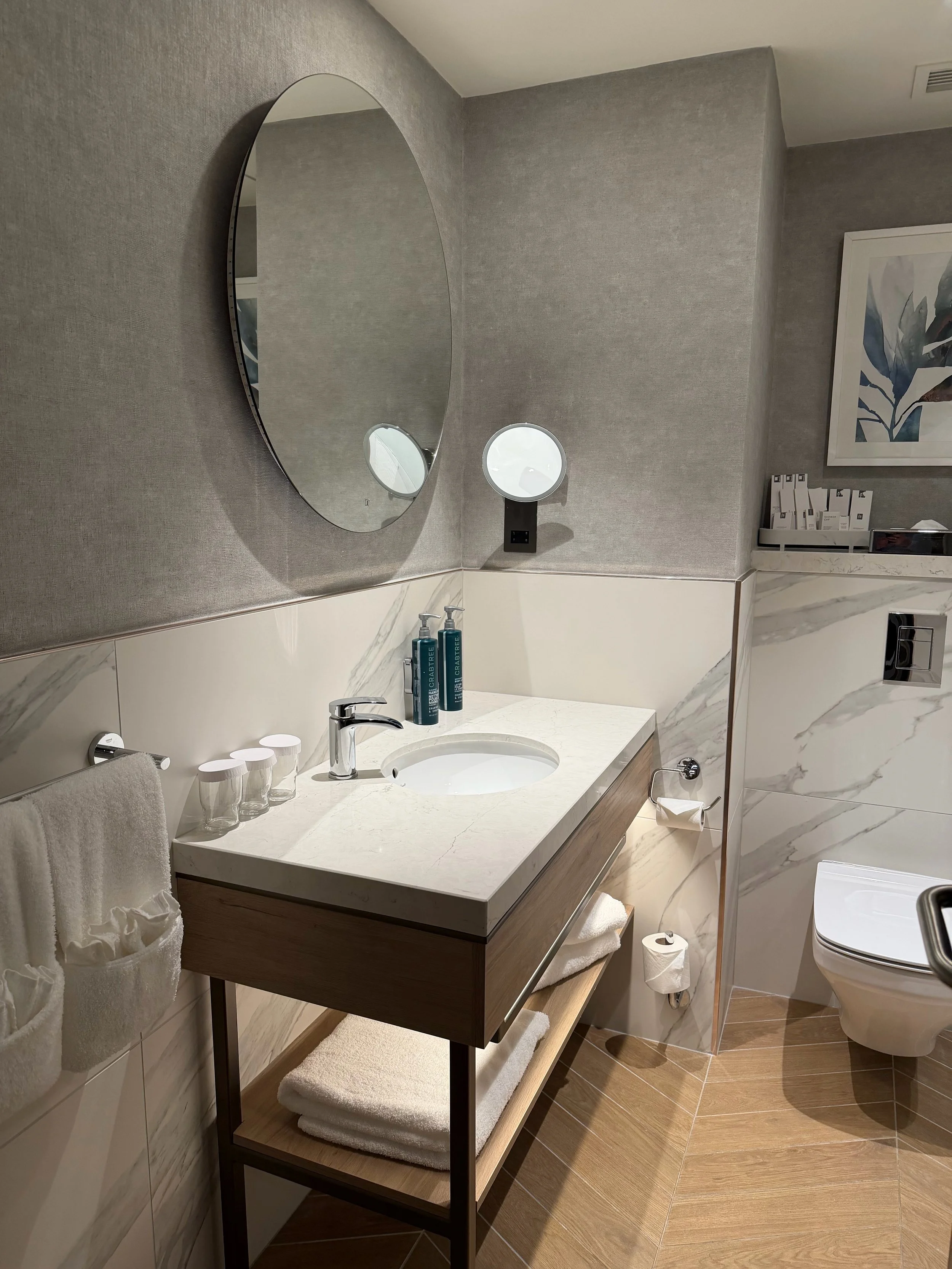 Hilton Dublin bathroom vanity with round mirror