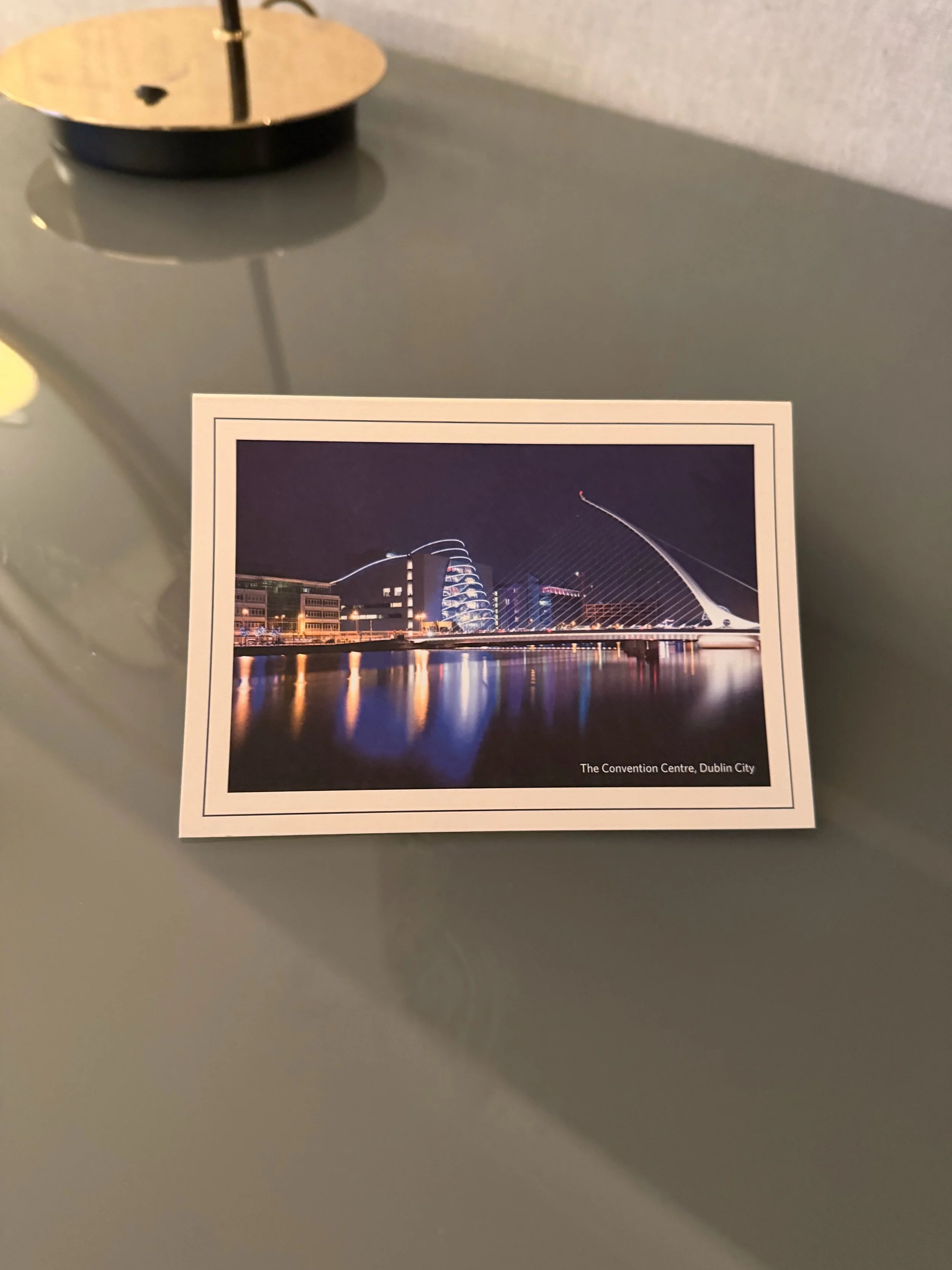 Hilton Dublin desk postcard of the Liffey at night