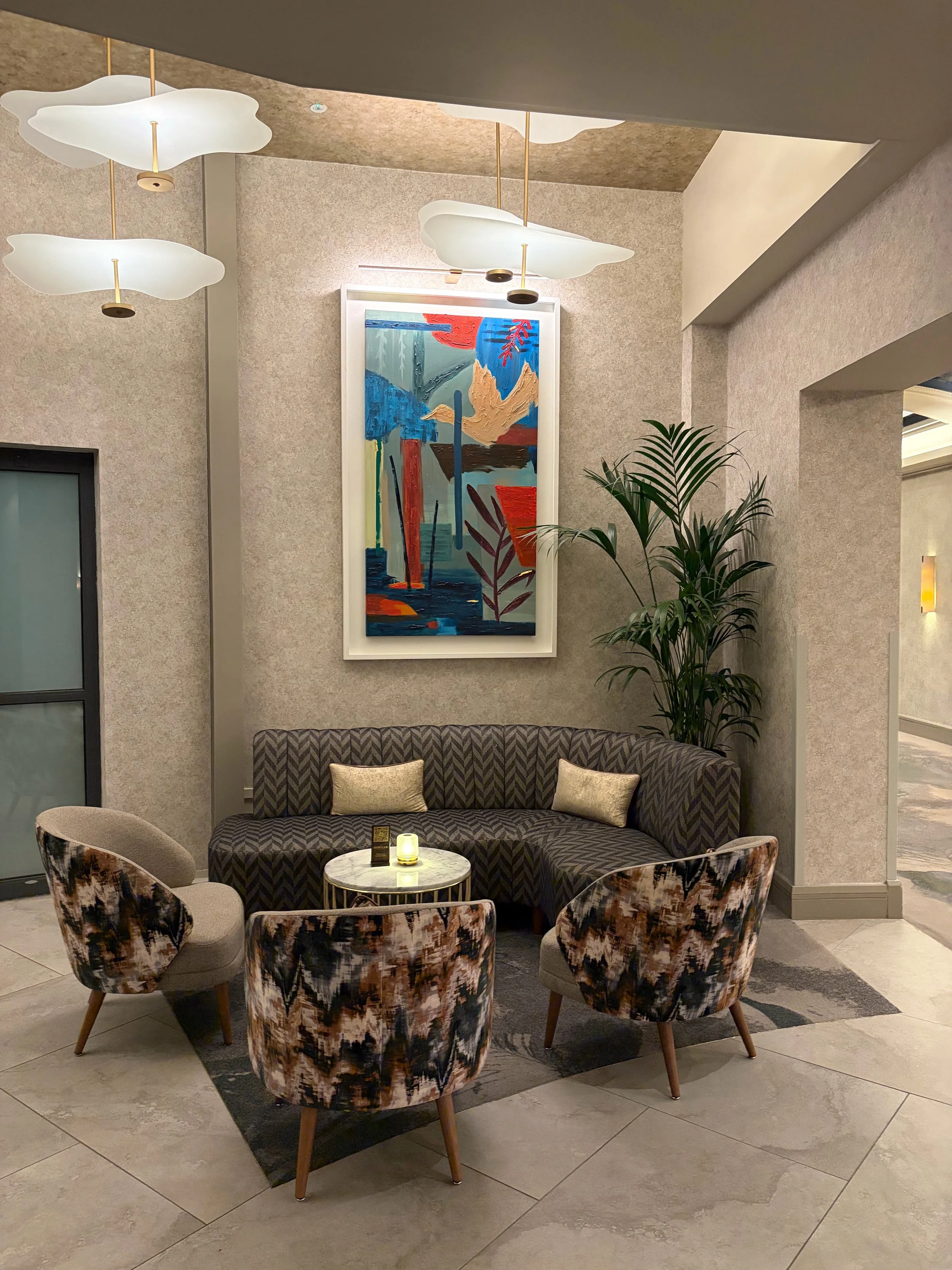 Hilton Dublin lounge seating area with colourful artwork