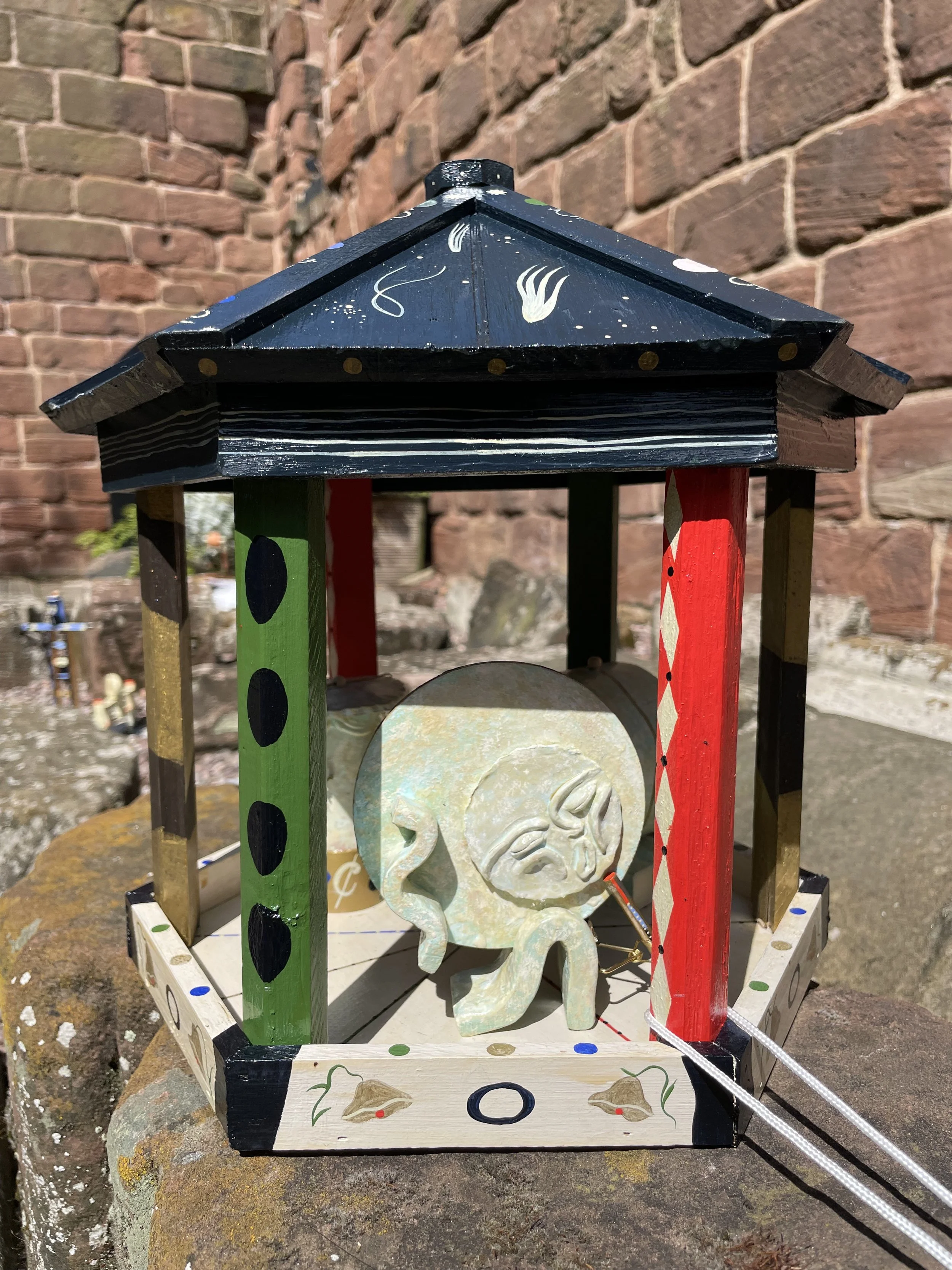 'FOAM, RIPPLE & WAVE PLAY THE MUSIC OF THE SPHERES' Three elements of the river ‘Foam, Ripple and Wave’ are joined together under a bandstand to play homage to the stars.  Considering how the flowing river and celestial realm work together in harmony