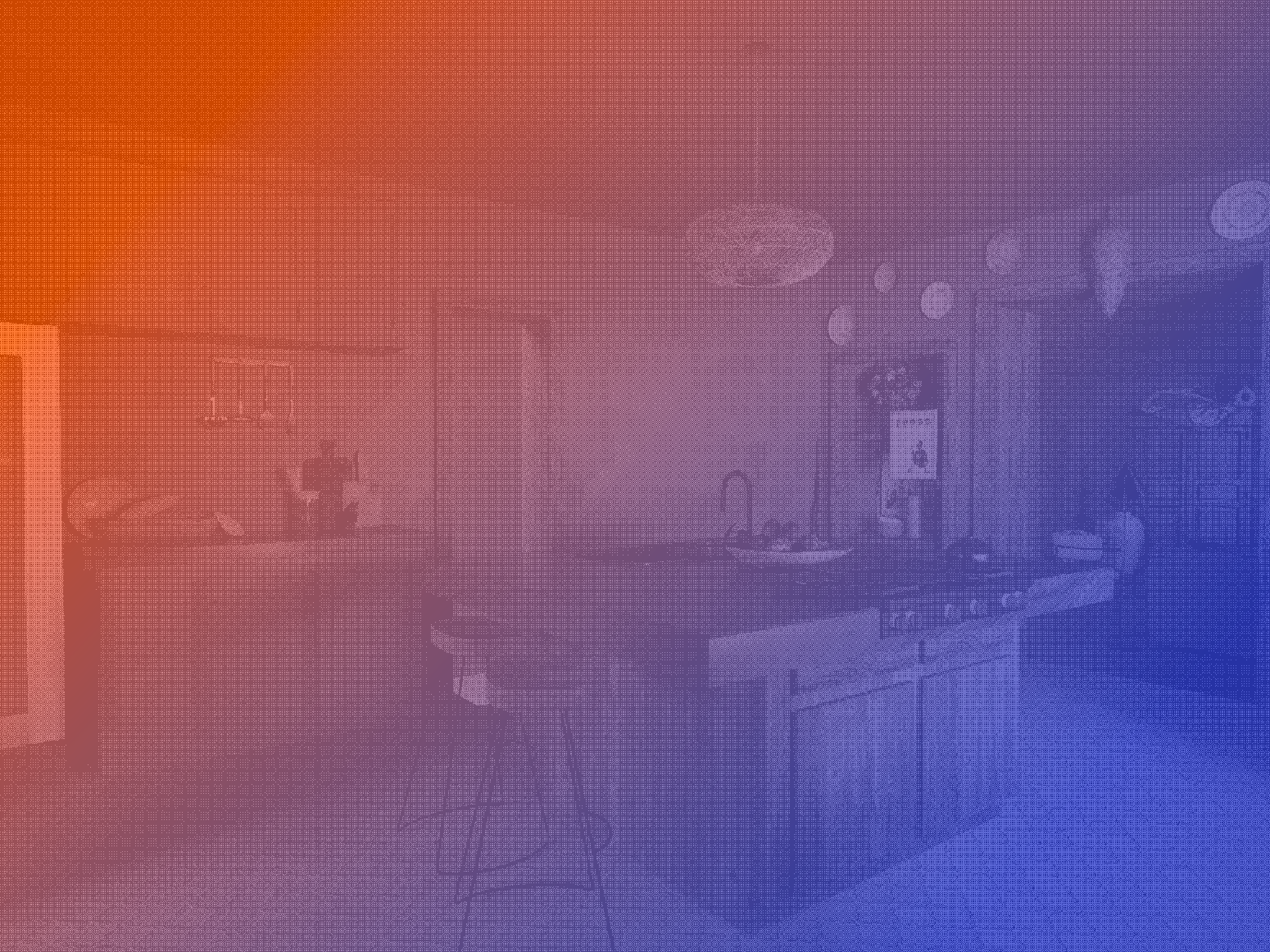 Kitchen with a dining table, chairs, sink, stove, and various kitchen appliances and decorations.