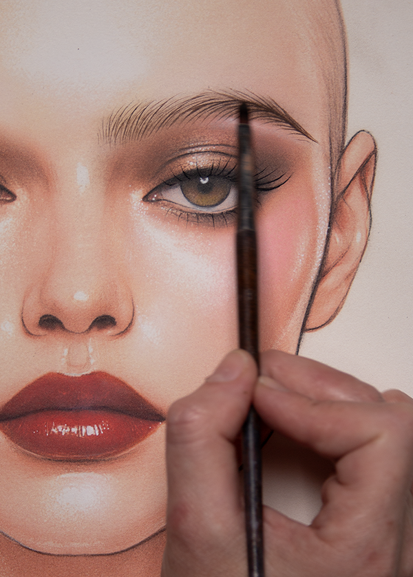 Eyebrow stroke practice on paper face chart using pencil to train flow and direction